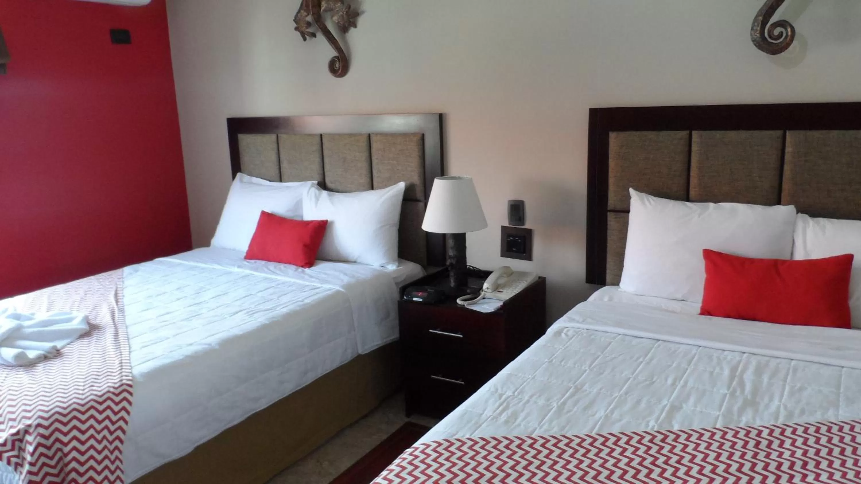 Photo of the whole room, Bed in Ramada by Wyndham Tikal Isla de Flores