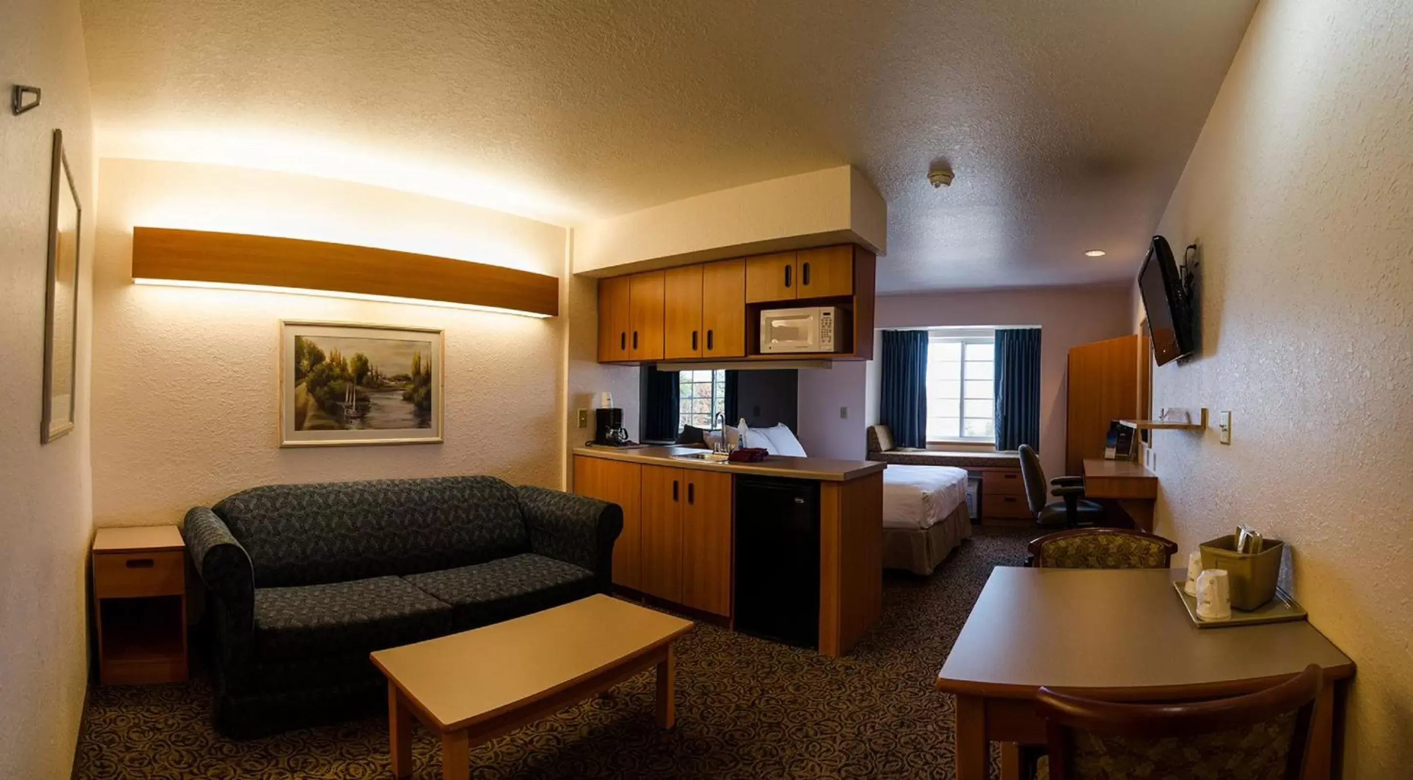 Photo of the whole room, Seating Area in Microtel Inn & Suites Tomah