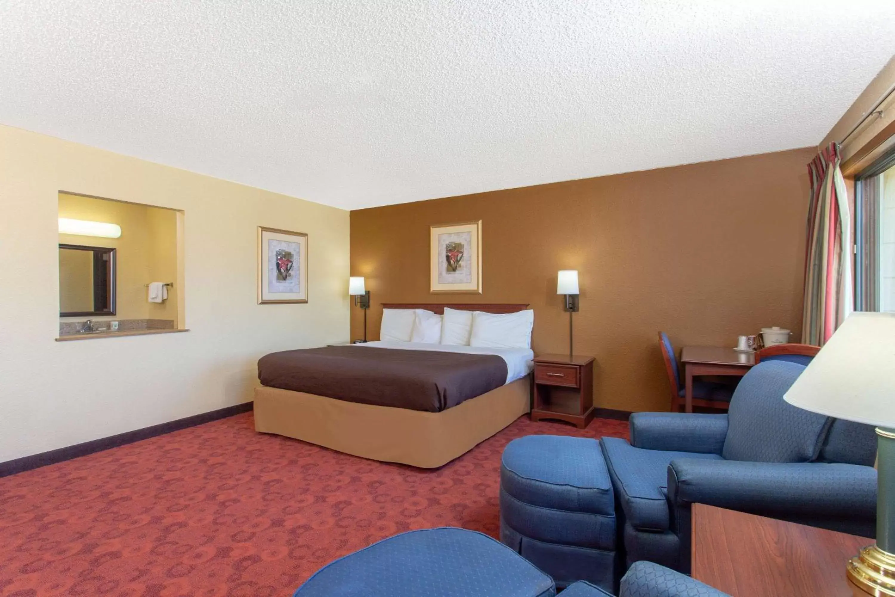 Photo of the whole room in AmericInn by Wyndham West Bend