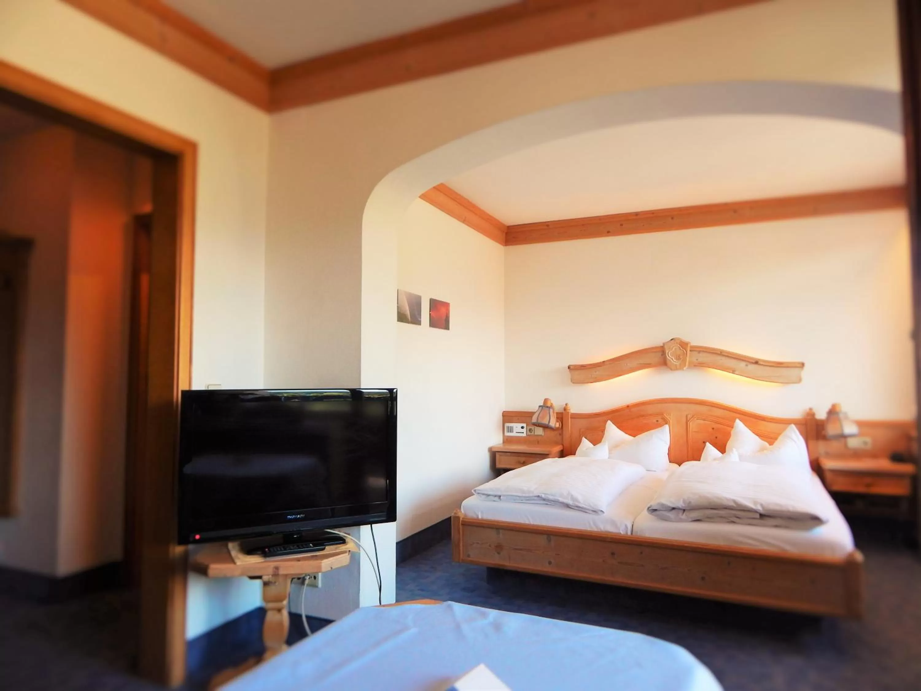 Bed in Hotel Vier Jahreszeiten