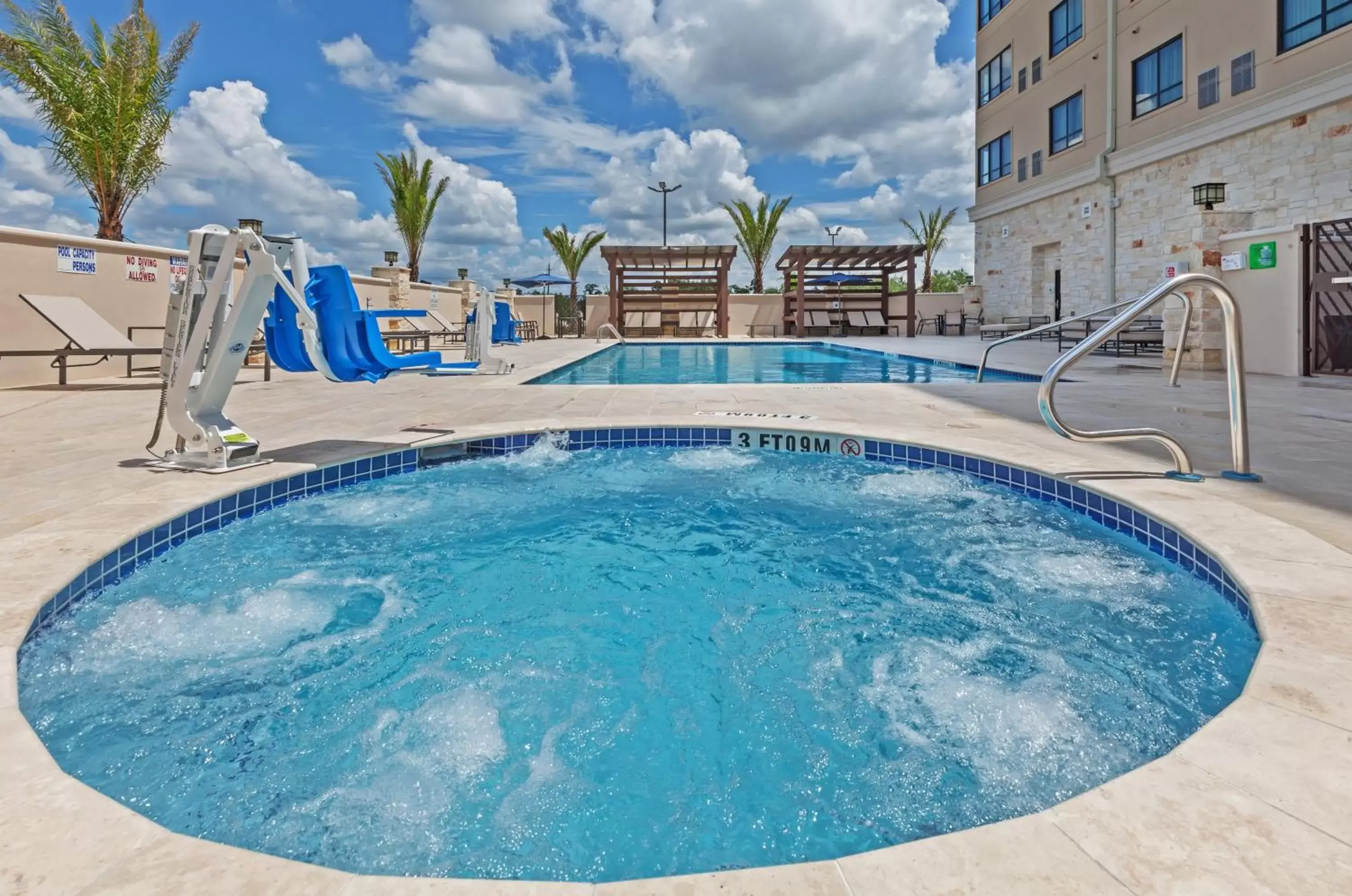 Swimming Pool in Holiday Inn Houston NE-Bush Airport Area, an IHG Hotel