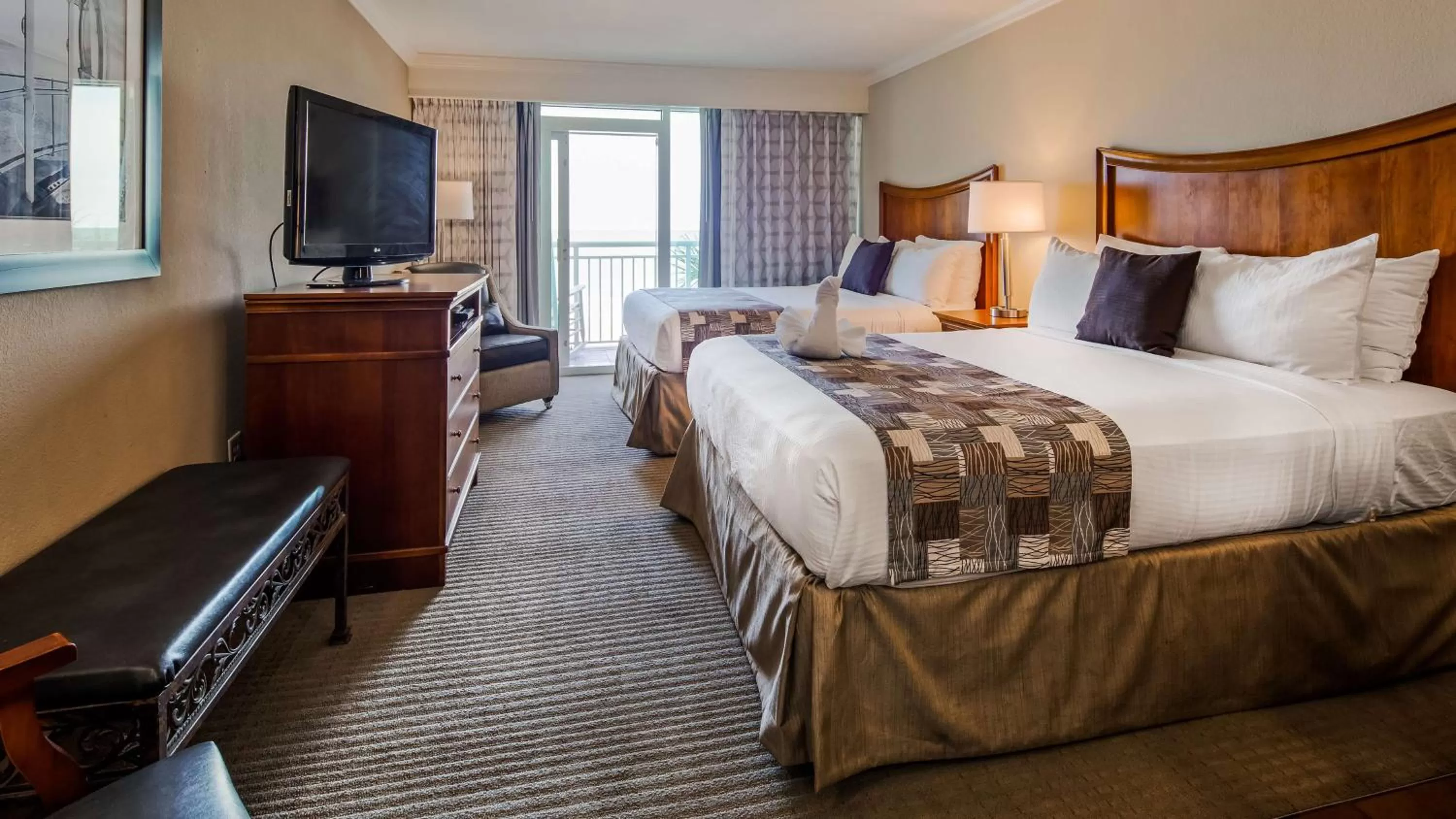 Photo of the whole room, Bed in The Sandbar Hotel, Trademark Collection by Wyndham