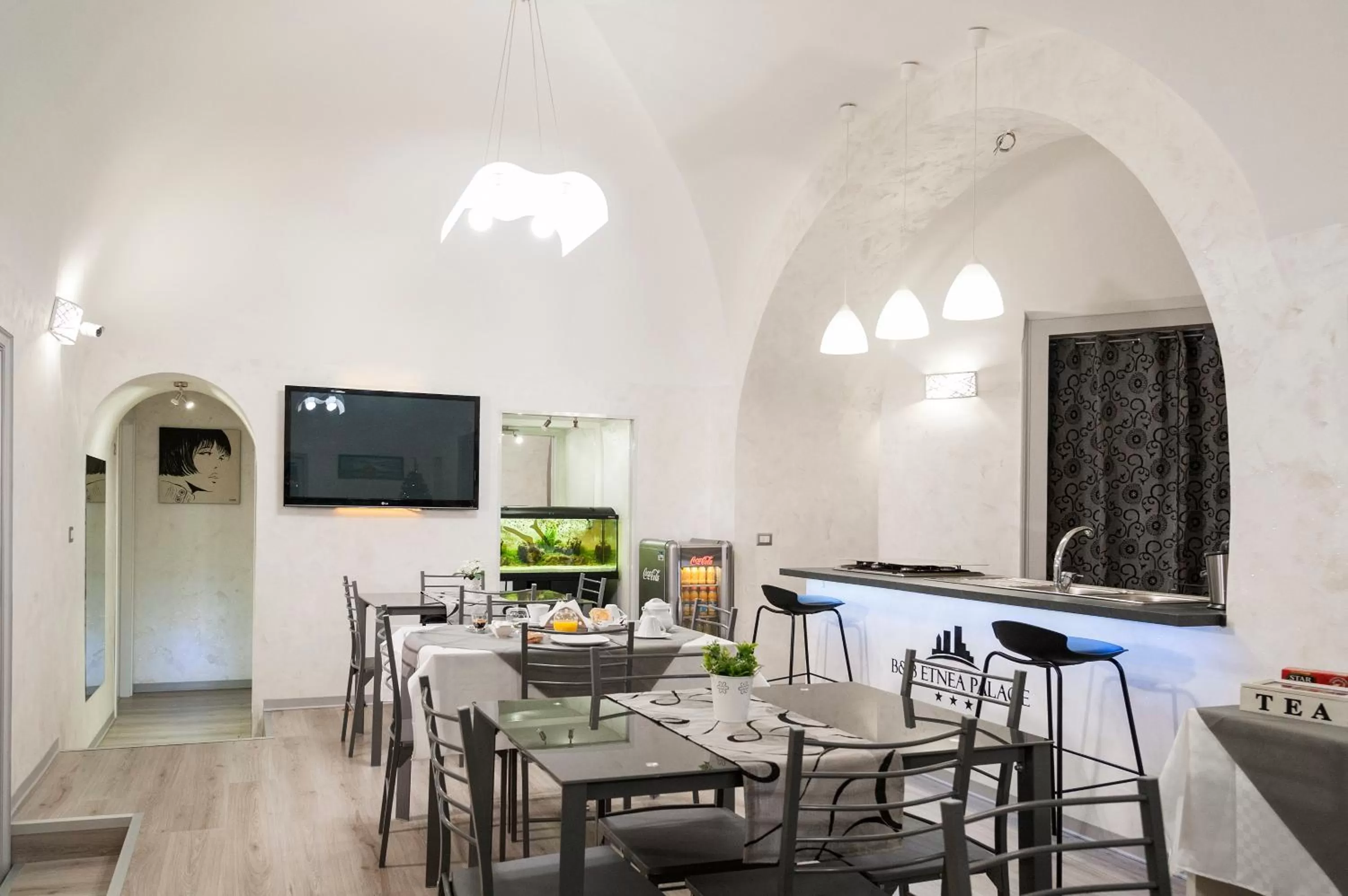 Communal lounge/ TV room in B&B Etnea Palace