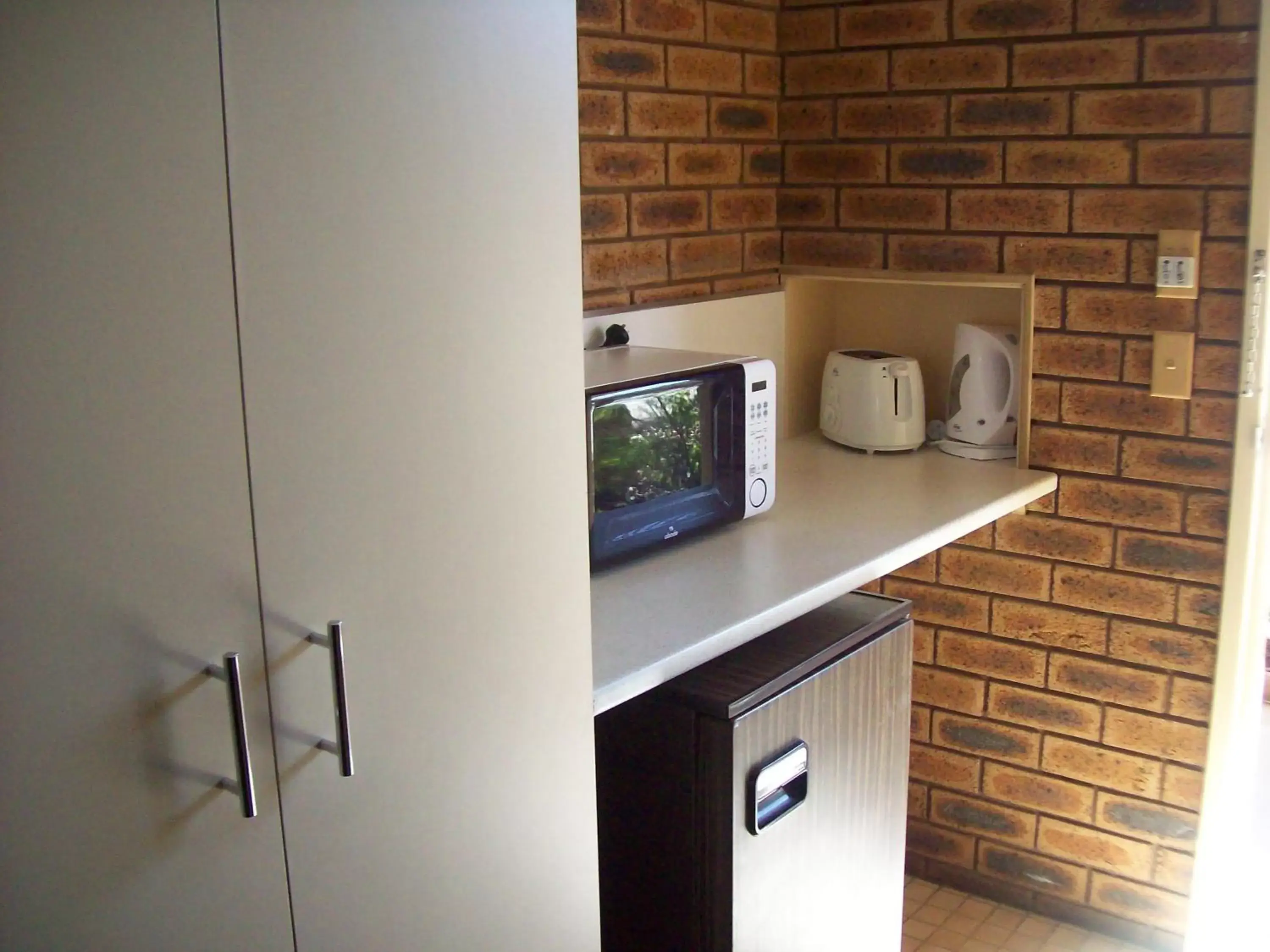 Kitchen or kitchenette, Kitchen/Kitchenette in Cobar Town & Country Motor Inn