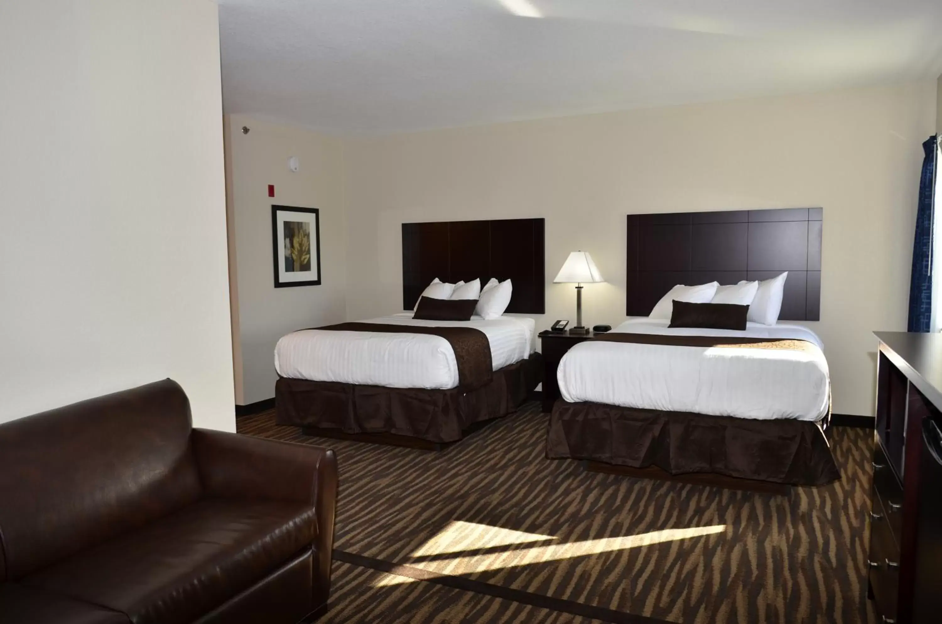 Bed in Cobblestone Inn & Suites - Manning