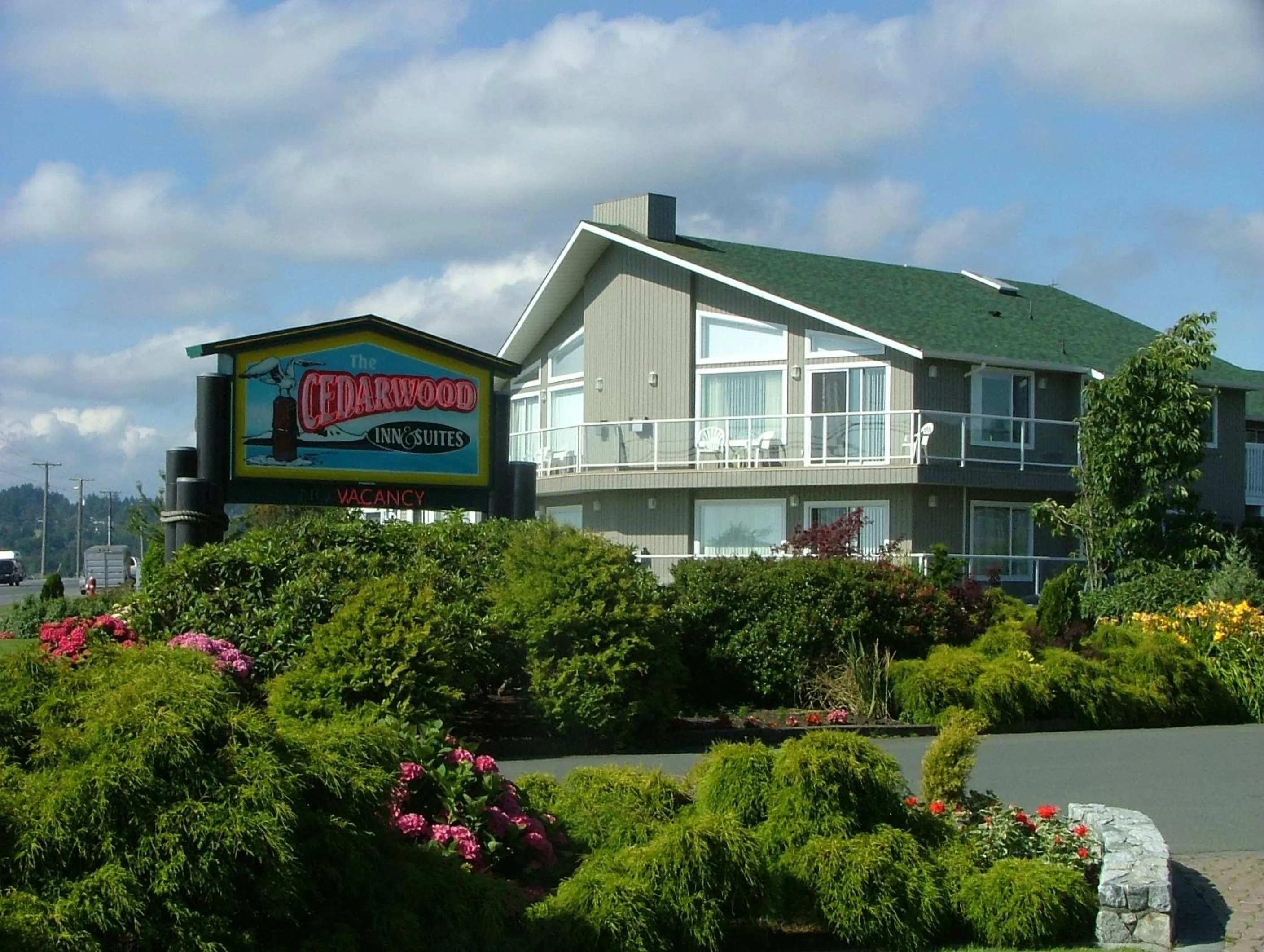 Property Building in The Cedarwood Inn & Suites