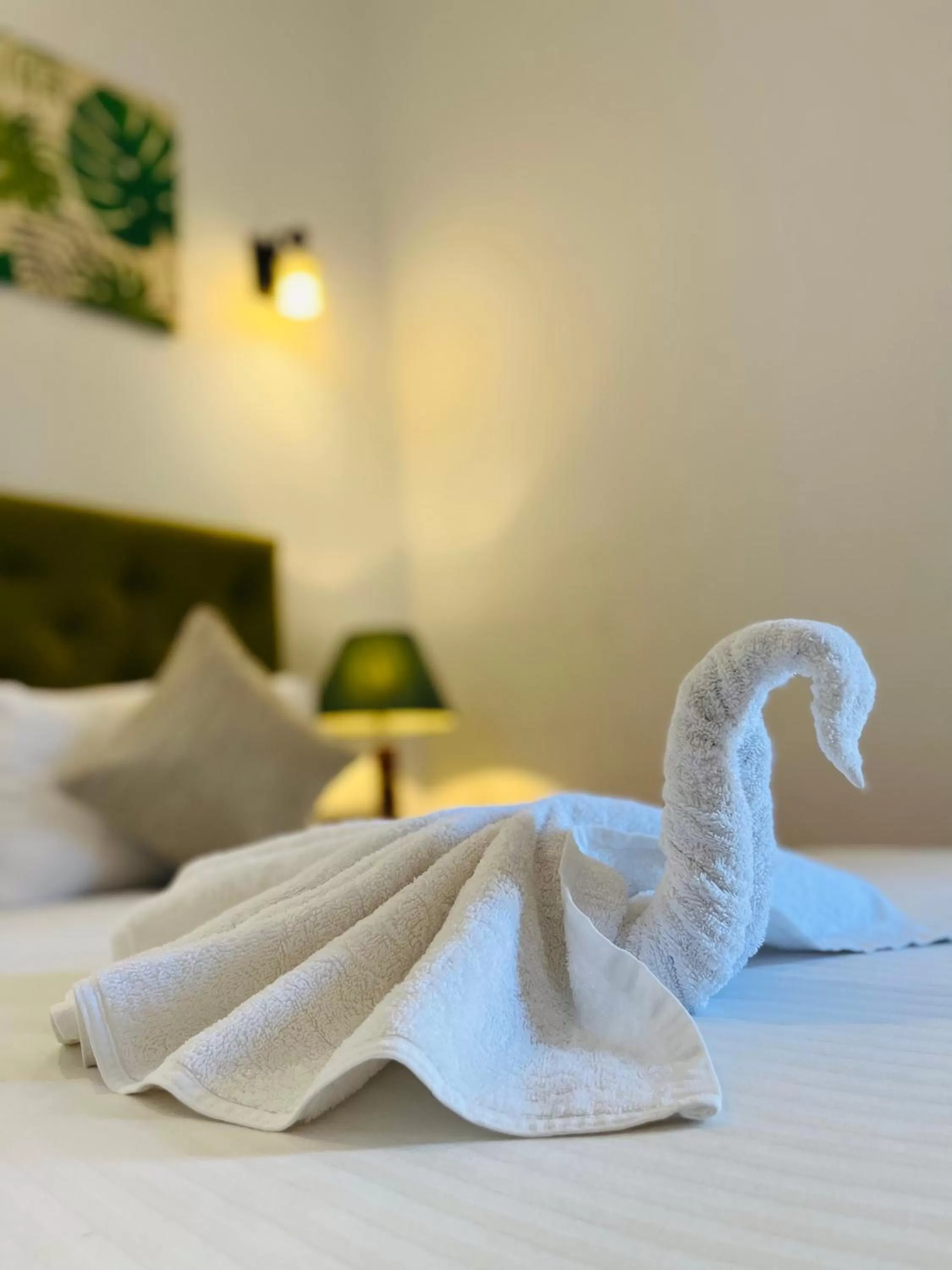 Bed in J leaf Hotel by Blue Bird