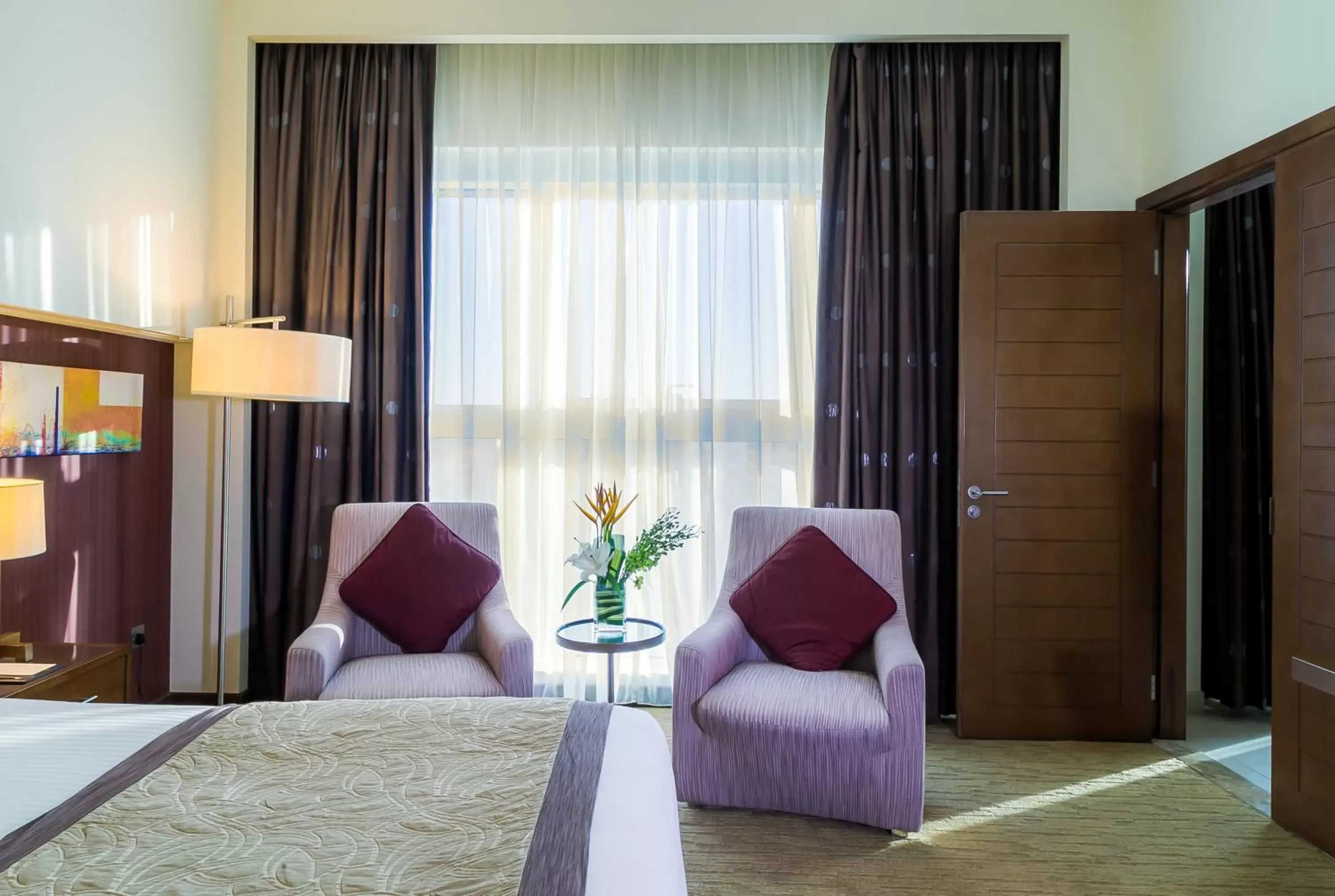 Bedroom, Seating Area in Grand Millennium Al Wahda Hotel and Executive Apartments Abu Dhabi