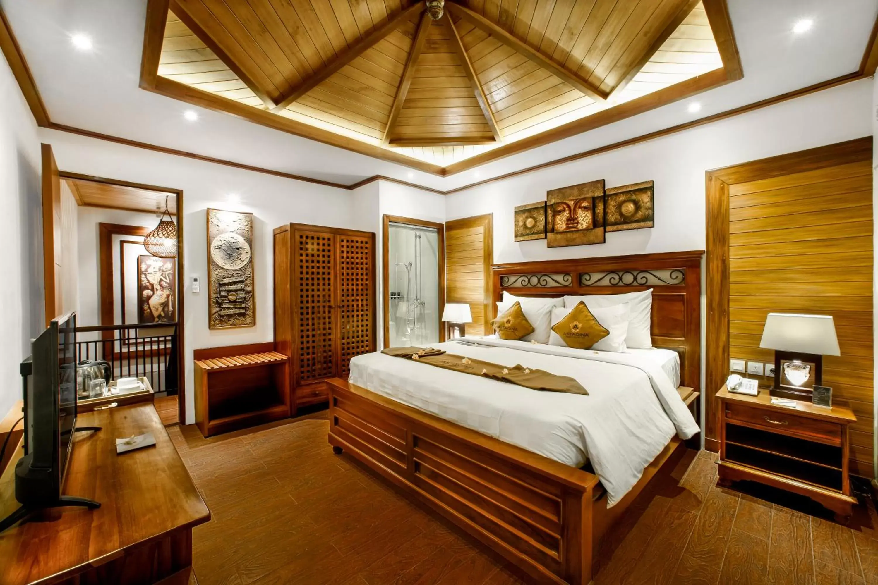 Bed in Astagina Resort Villa and Spa