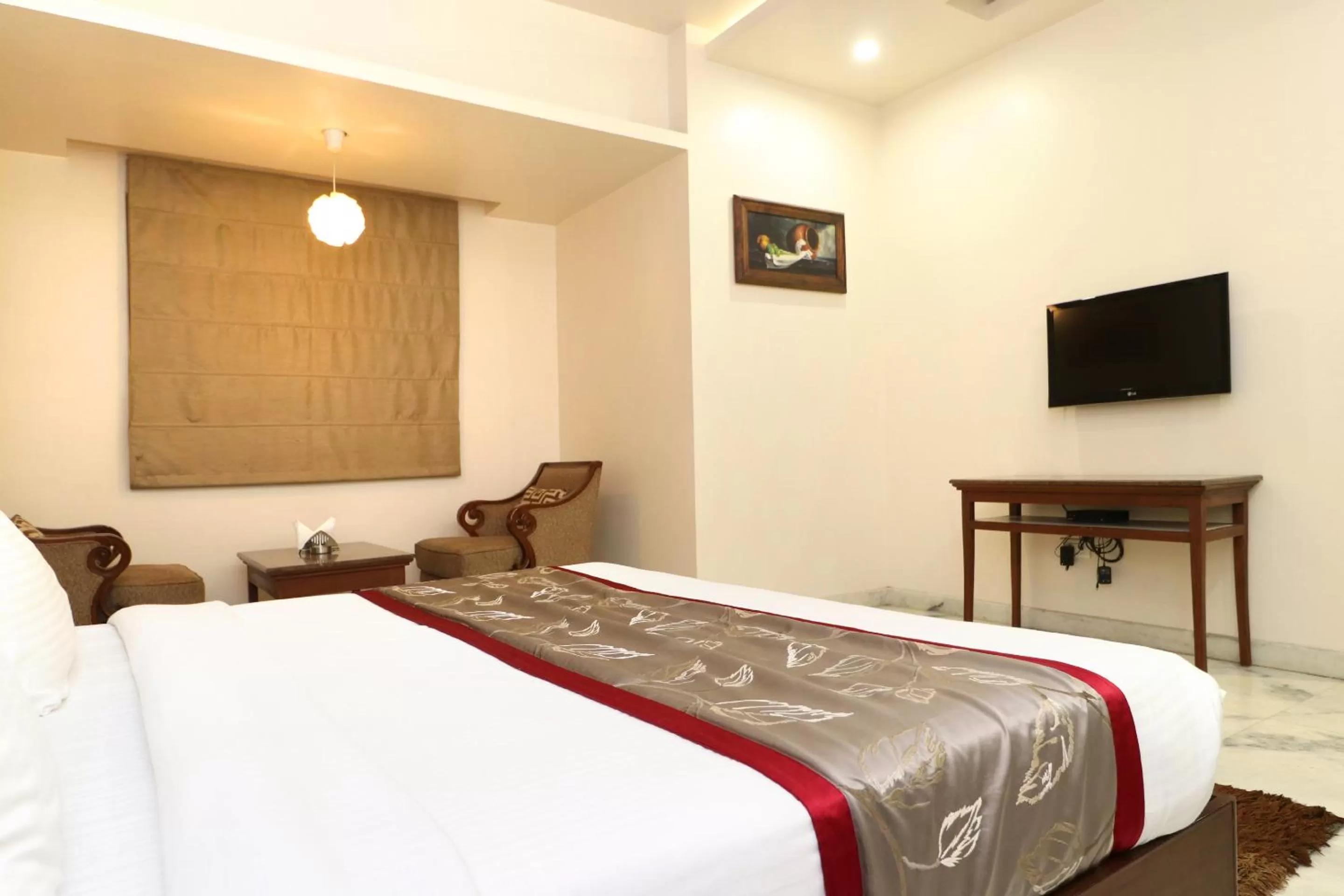 Bed in Hotel Leela Grande