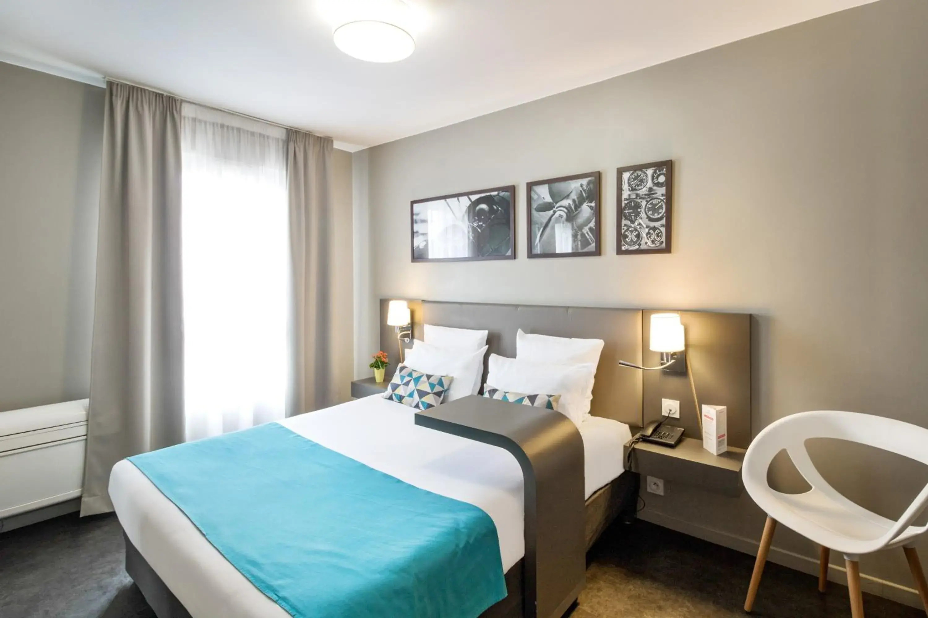 Bedroom, Bed in Appart'City Confort Le Bourget - Aeroport