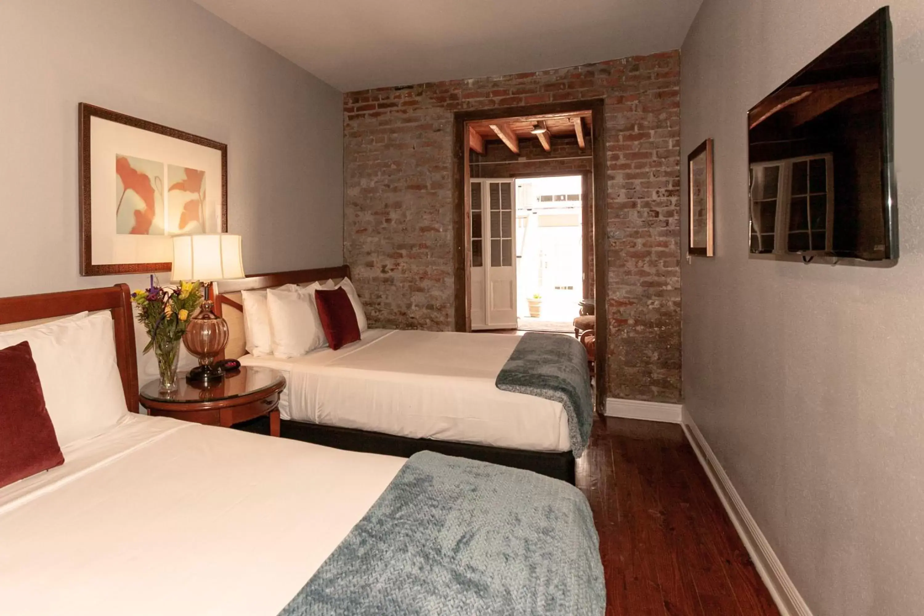 Bedroom, Bed in French Quarter Courtyard Hotel and Suites