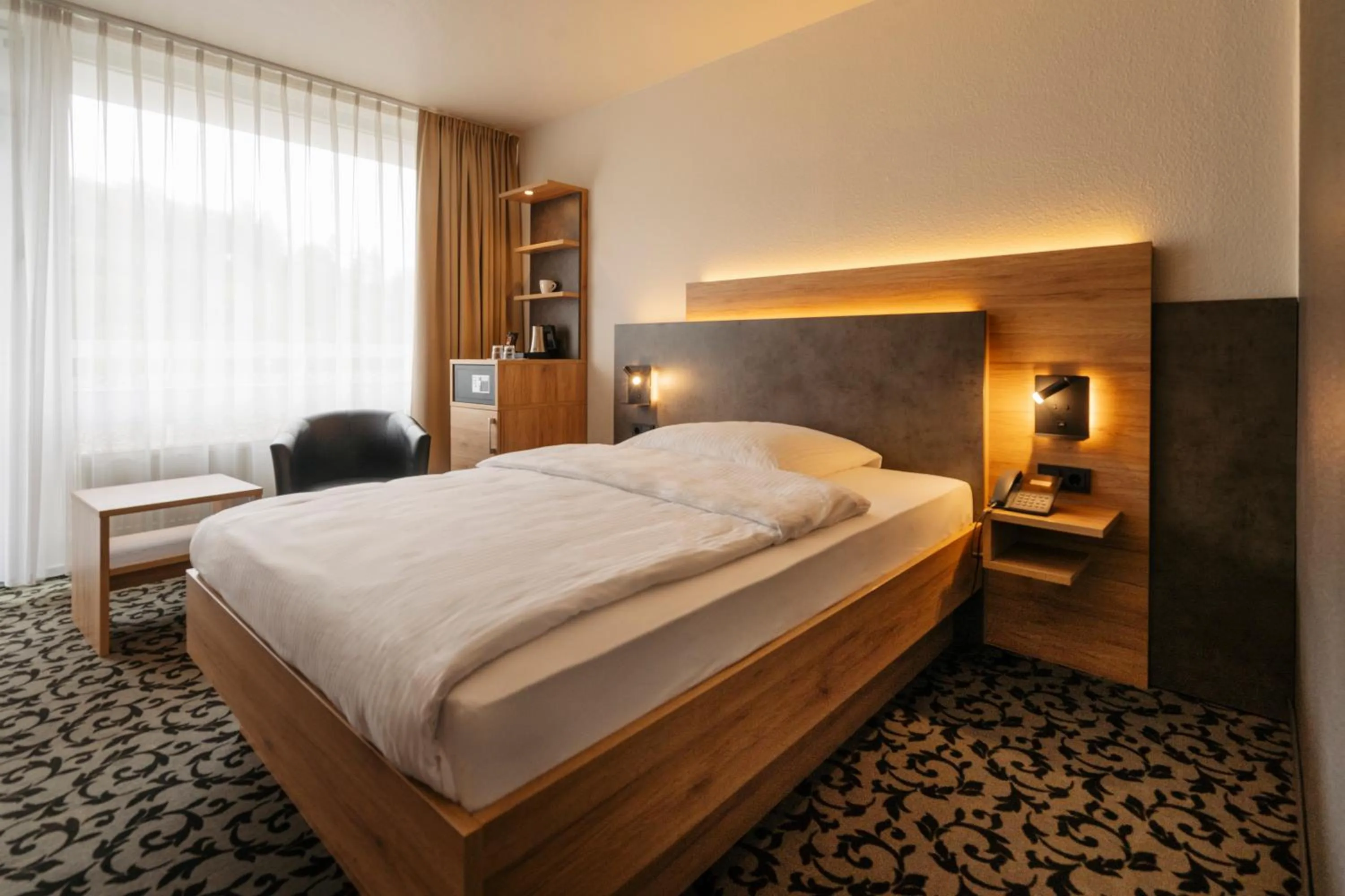 Bed in Caravelle Hotel im Park