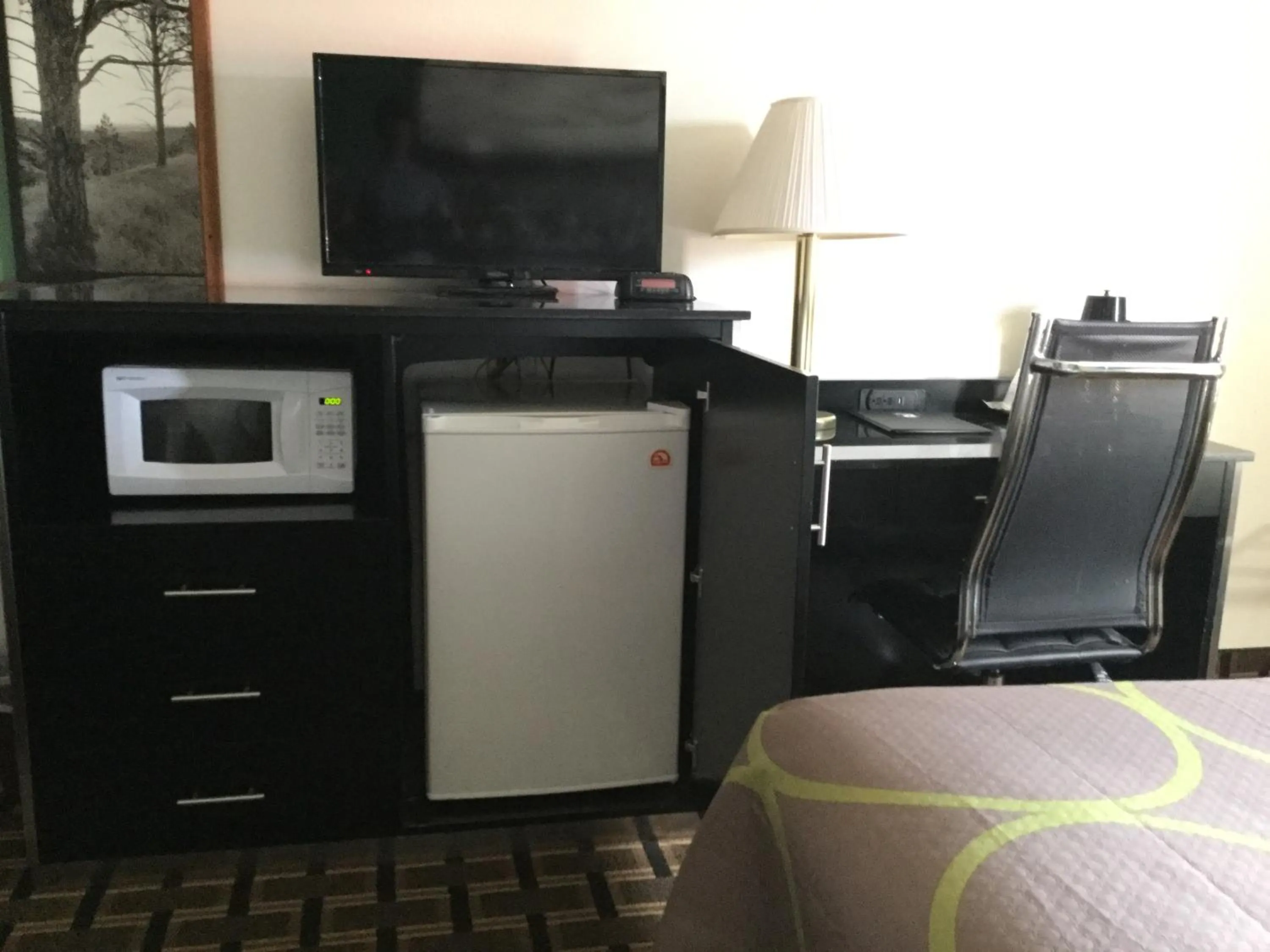 Photo of the whole room, TV/Entertainment Center in Super 8 by Wyndham Wayne