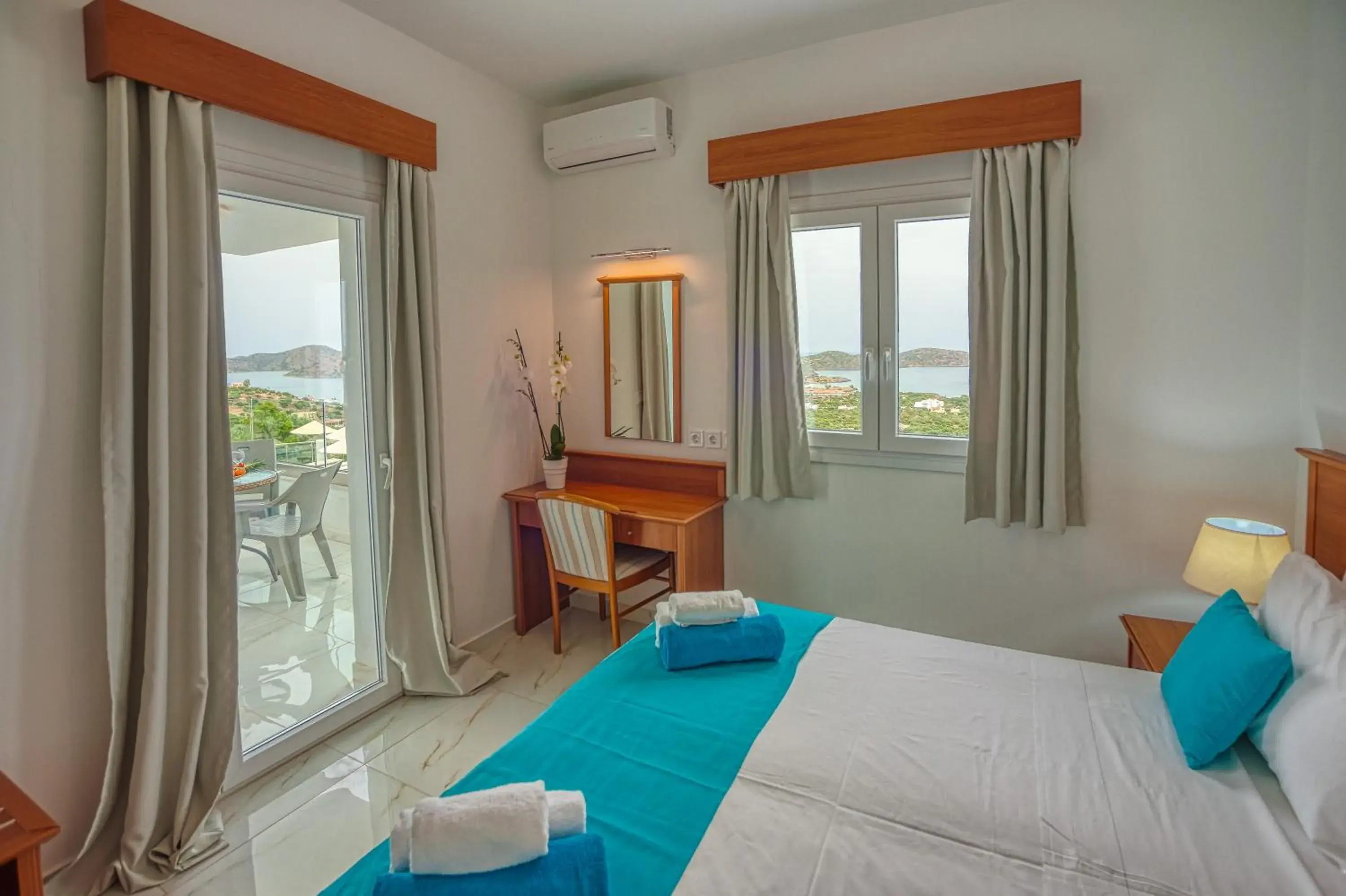 Bedroom, Bed in Elounda Water Park Residence Hotel