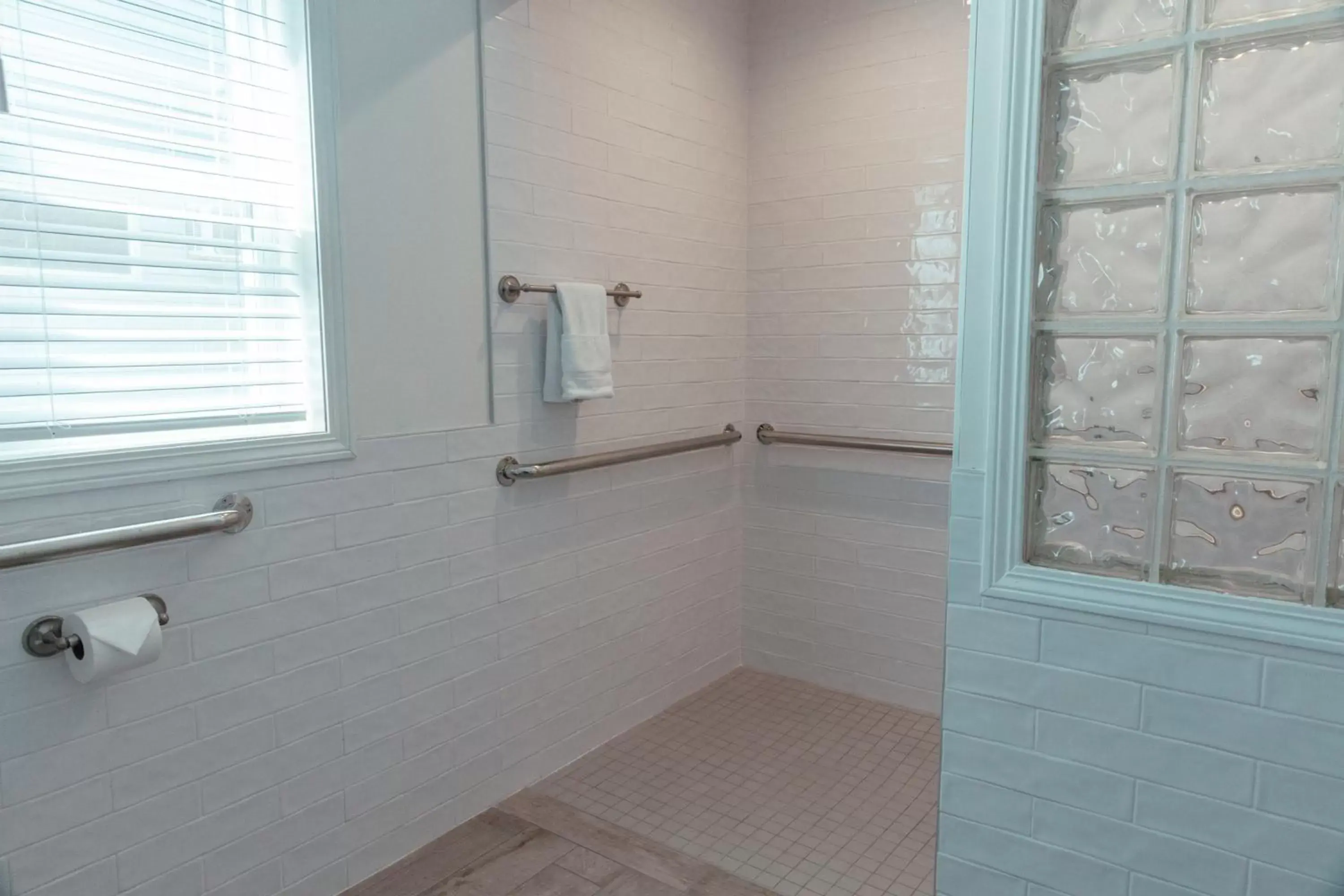Shower, Bathroom in Skaneateles Suites Boutique Hotel