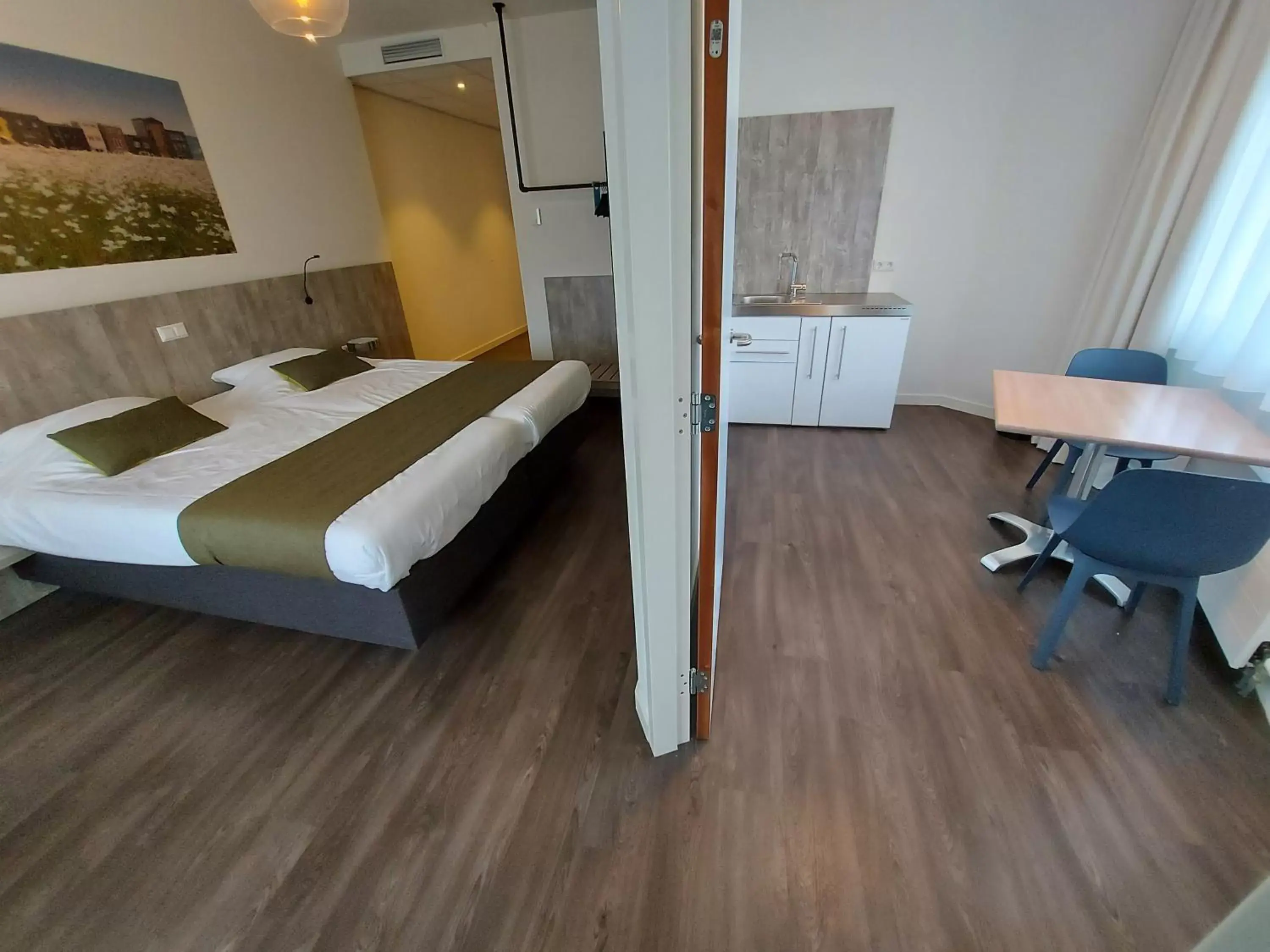 Kitchen or kitchenette, Bed in ibis Styles Almere