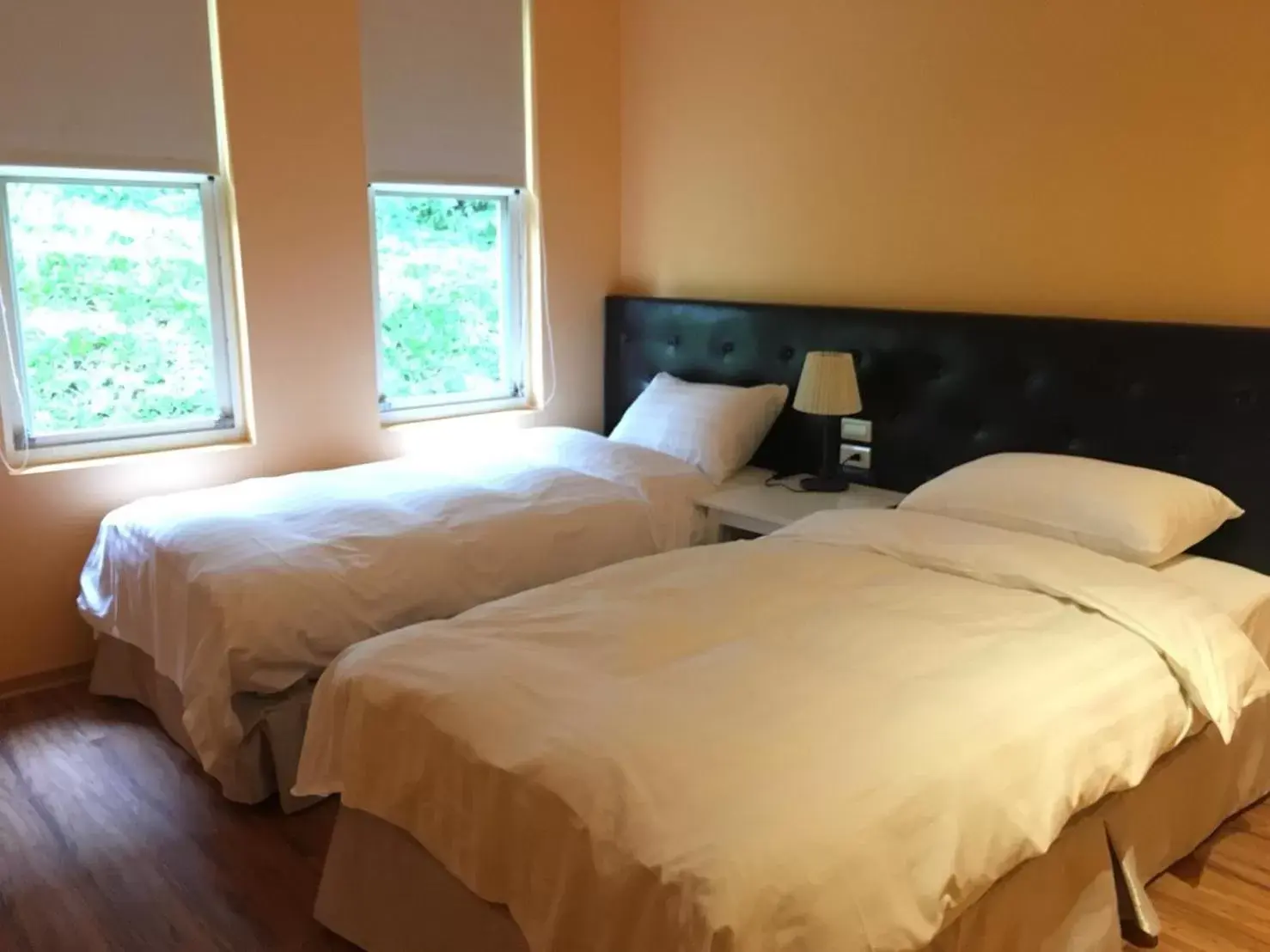 Bed in American Village Resort