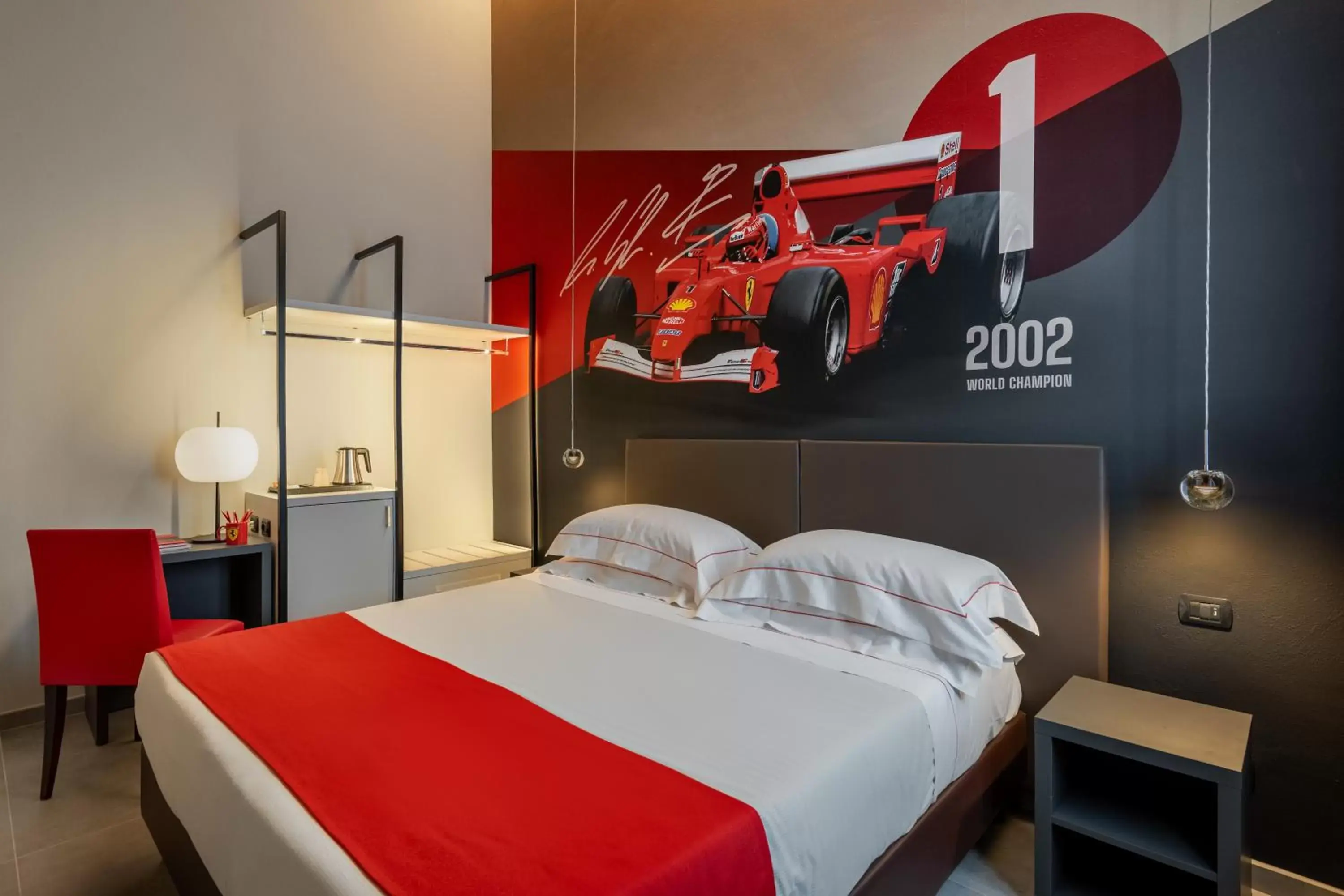 Bed in Hotel Maranello Village