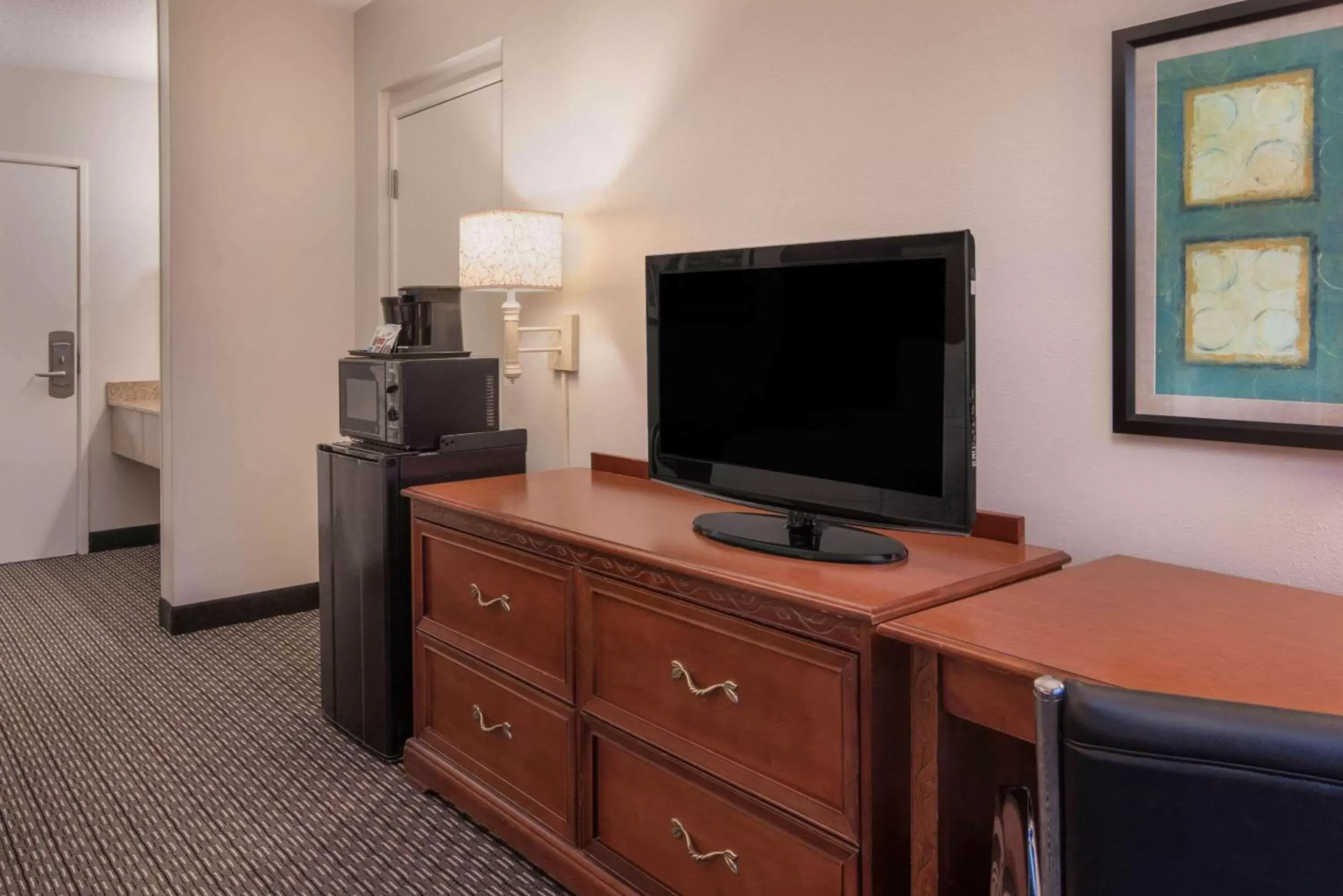 Photo of the whole room, TV/Entertainment Center in La Quinta by Wyndham Naples East (I-75)