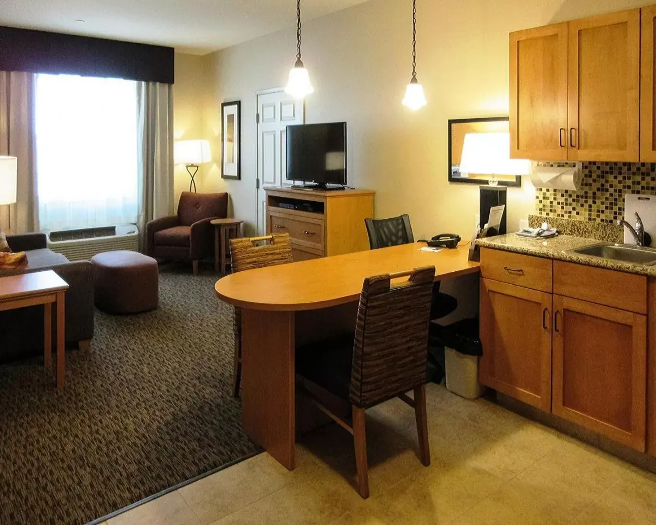 TV and multimedia, TV/Entertainment Center in MainStay Suites Sidney - Medical Center