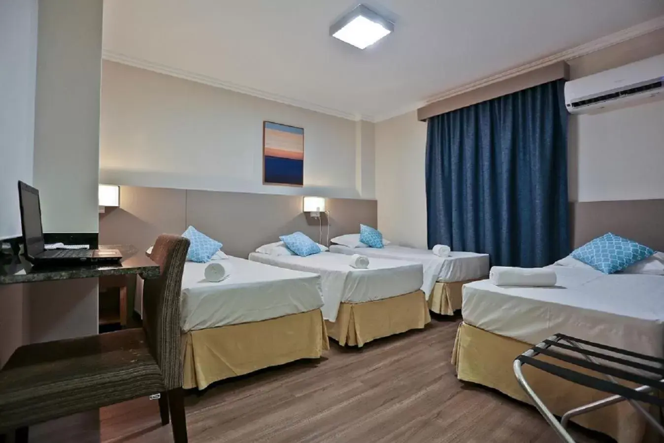 Bed in Sandri City Hotel