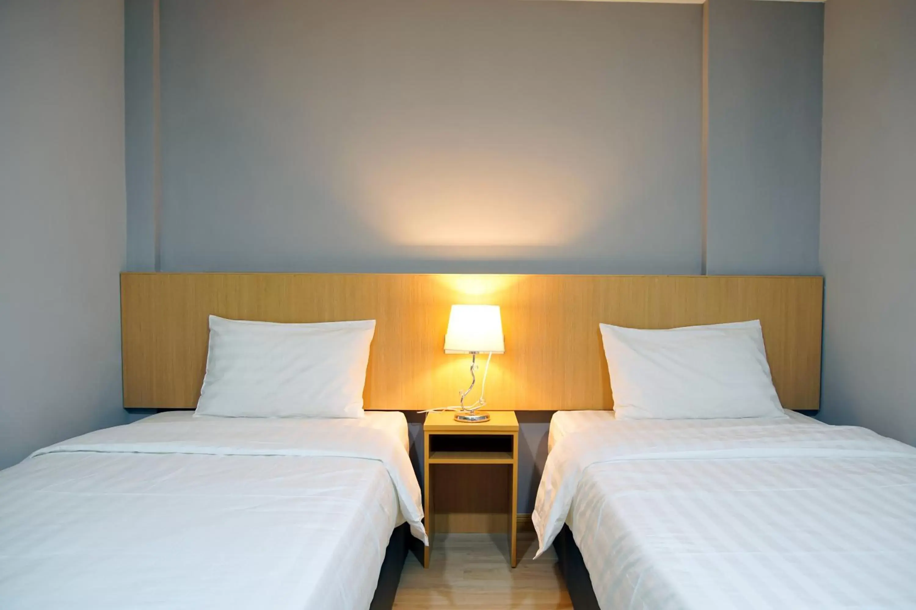 Bed in Labuan Avenue Hotel