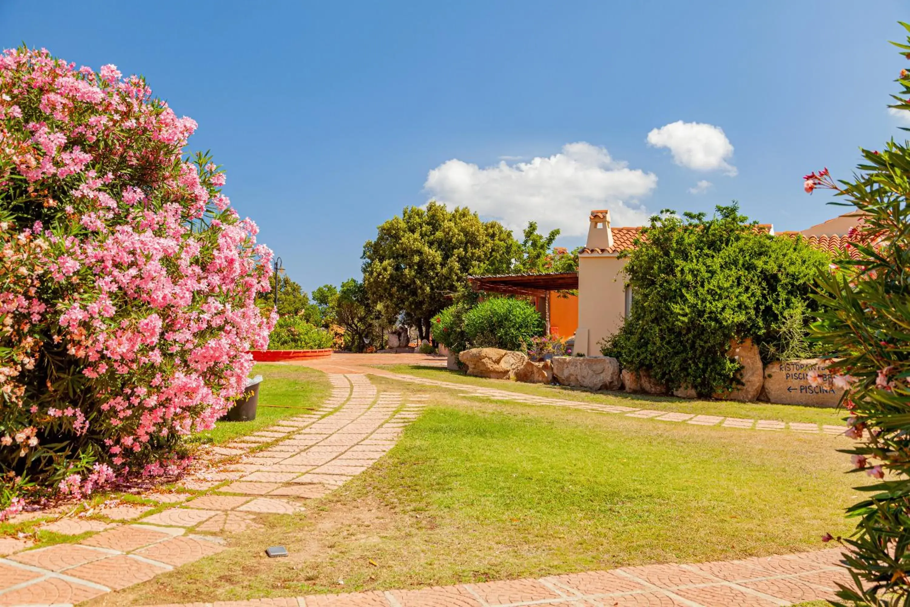 Property building in Residence Hotel Lu Nibareddu Property building in Residence Hotel Lu Nibareddu