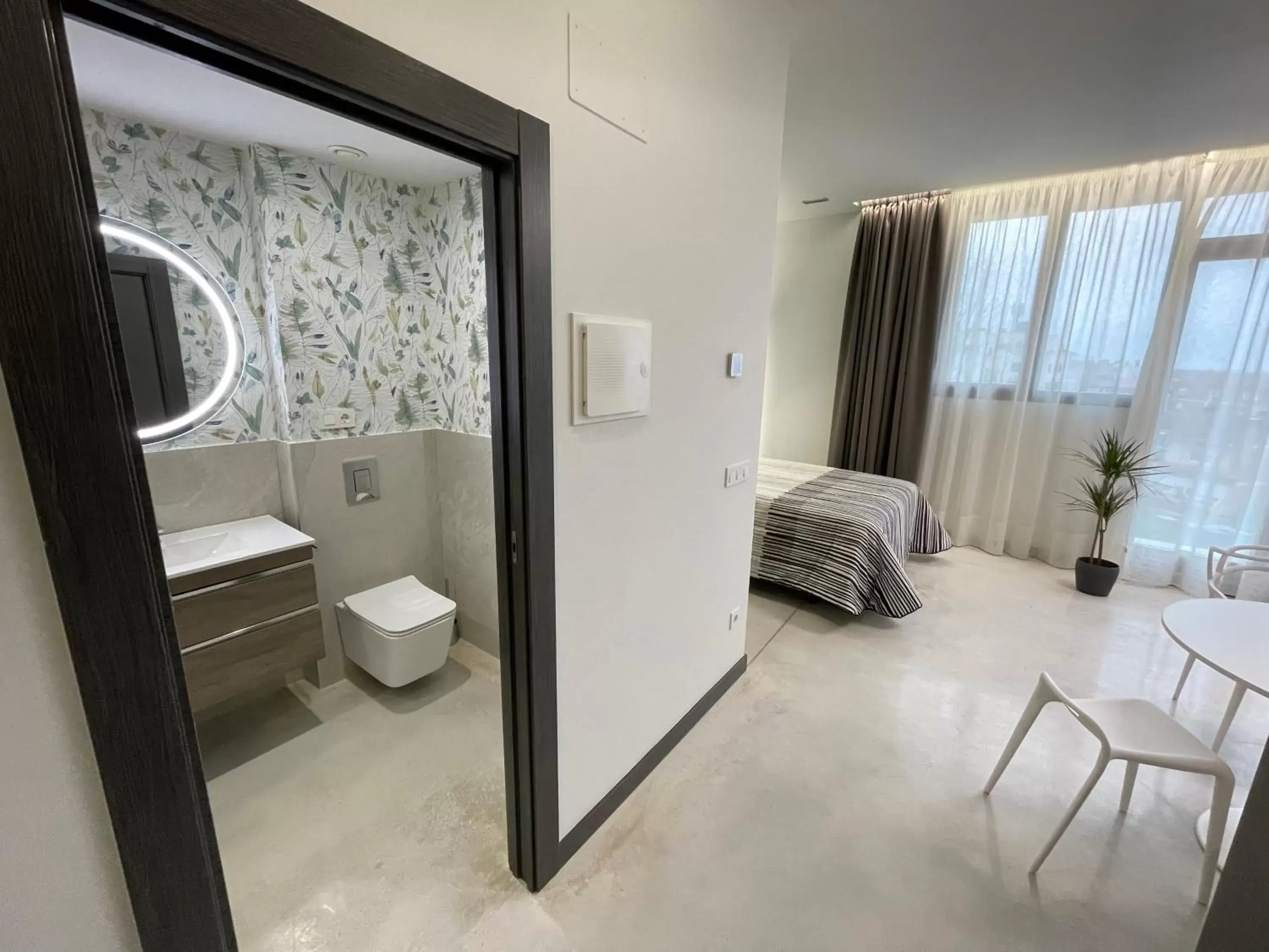 Bathroom in Apartamentos Aljama