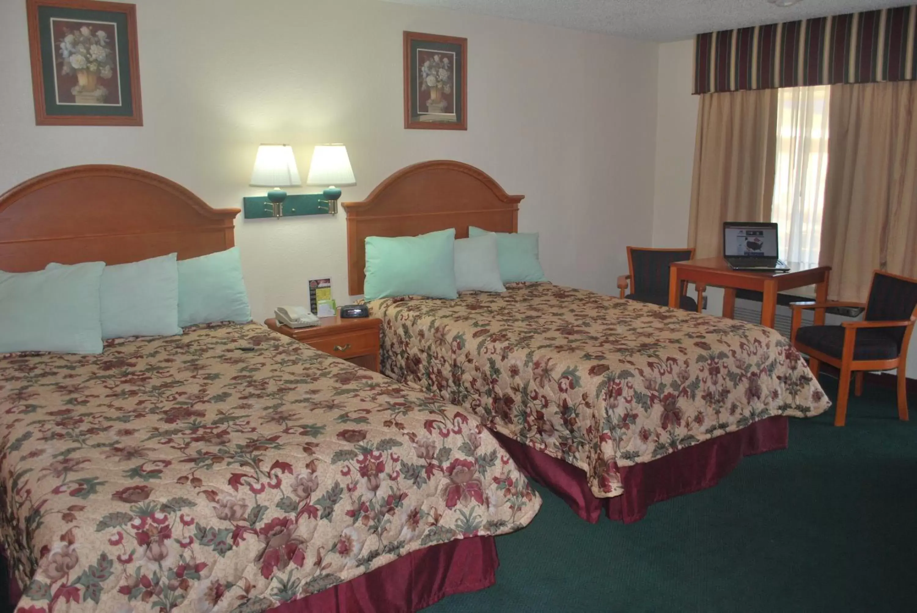 Bed in Americas Best Value Inn Lubbock East