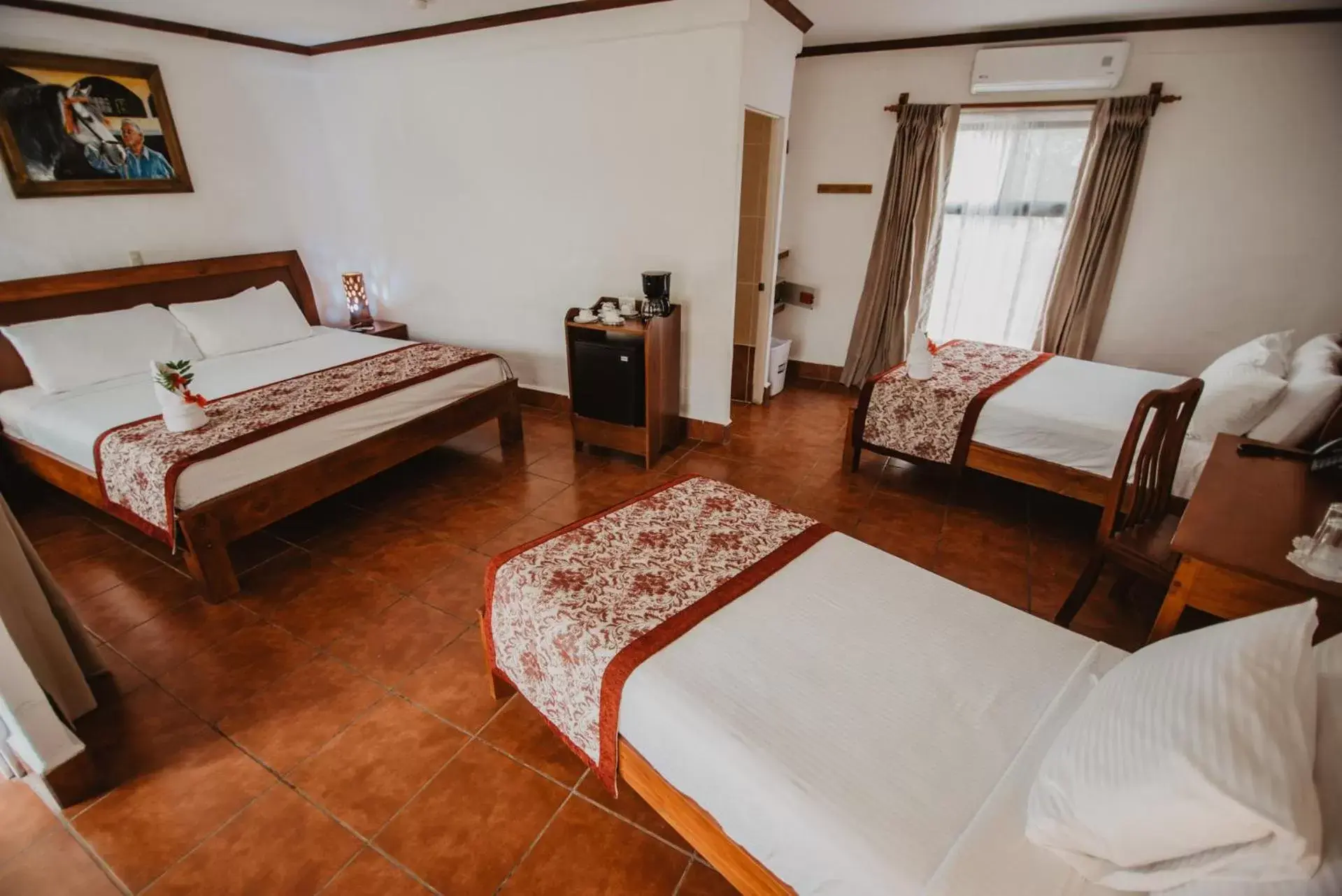 Bedroom, Room Photo in Hacienda Guachipelin Volcano Ranch Hotel & Hot Springs