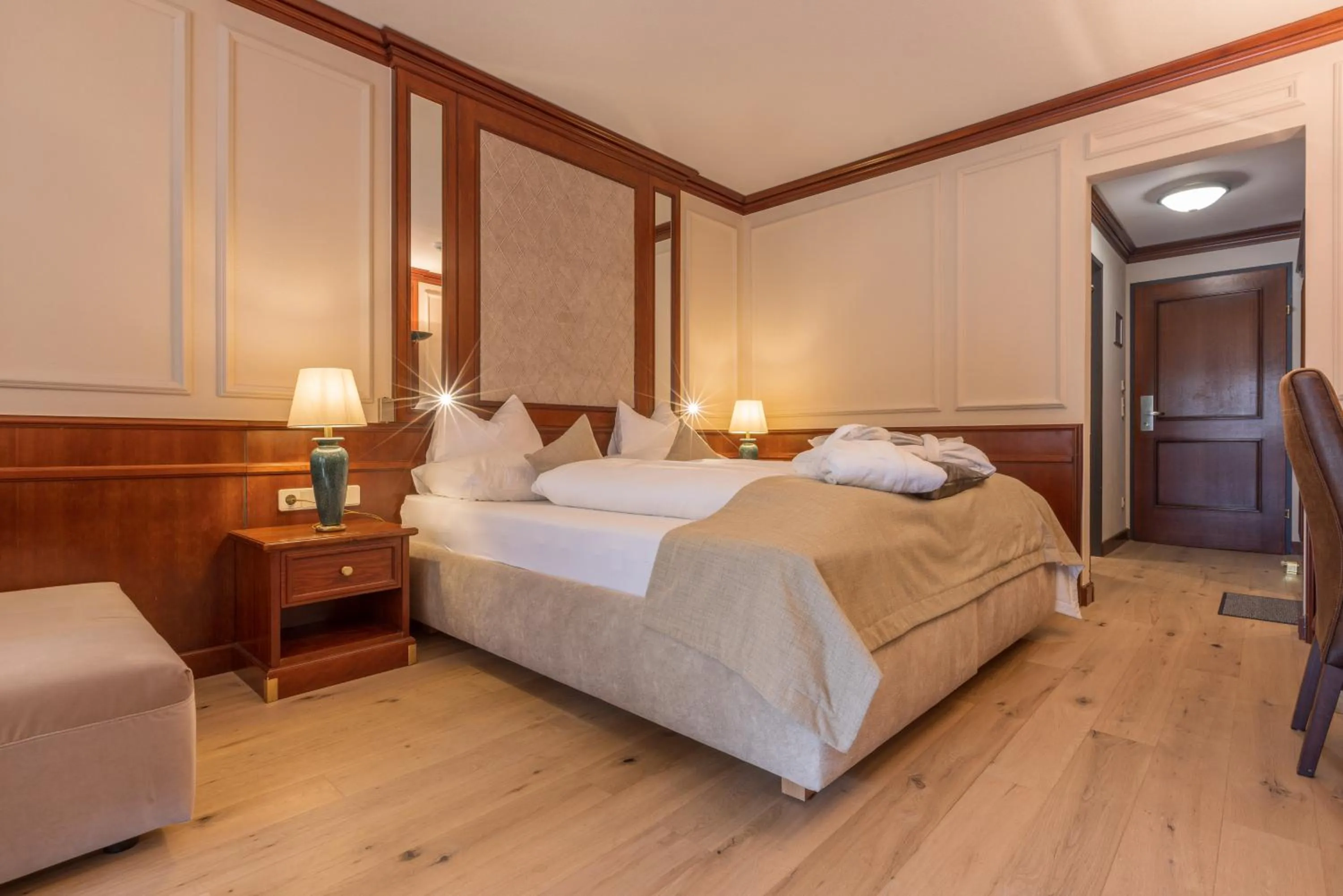 Bed in MANNI das Hotel