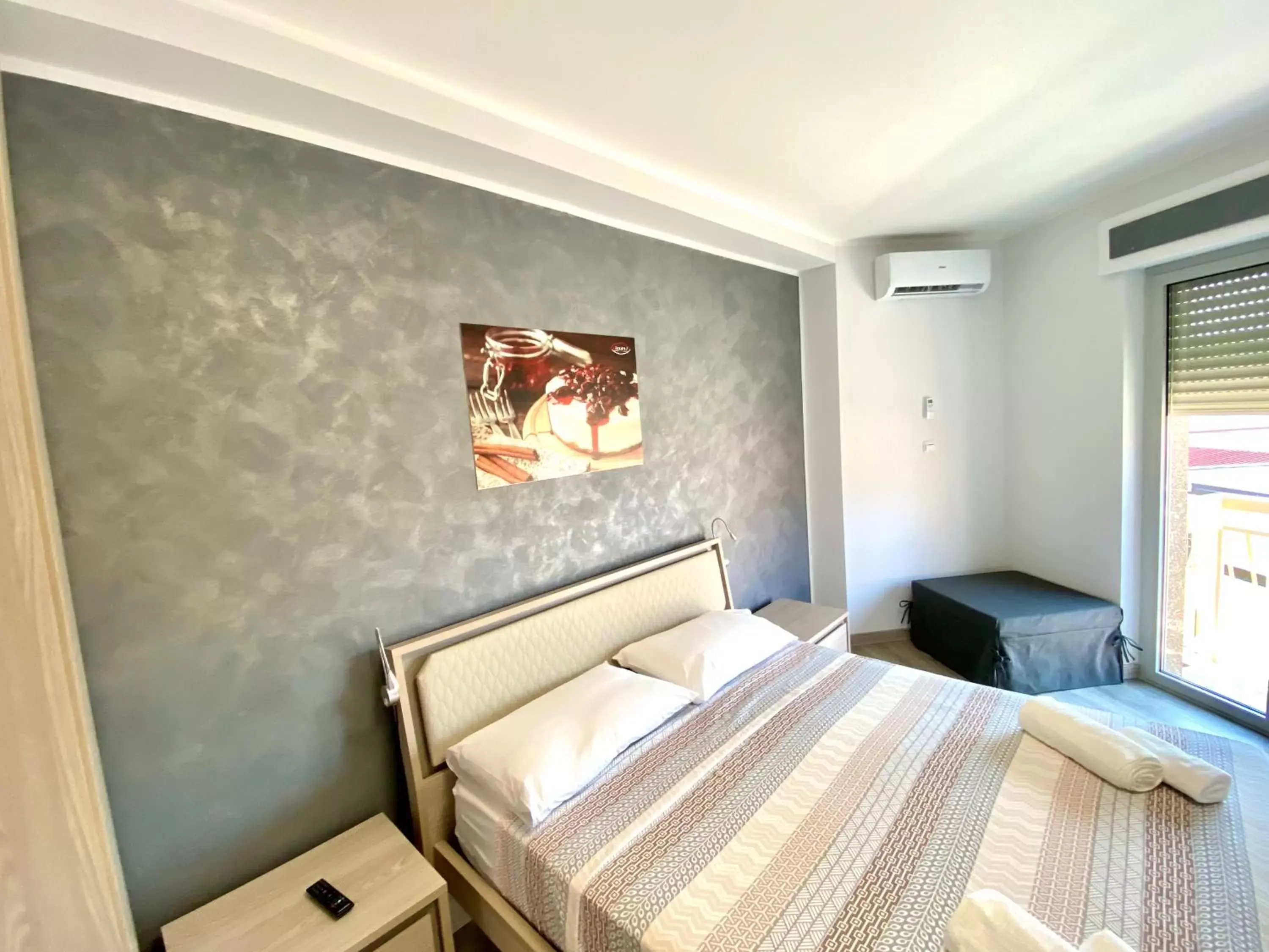 Bed in Siclari B&B-Rooms&Suite