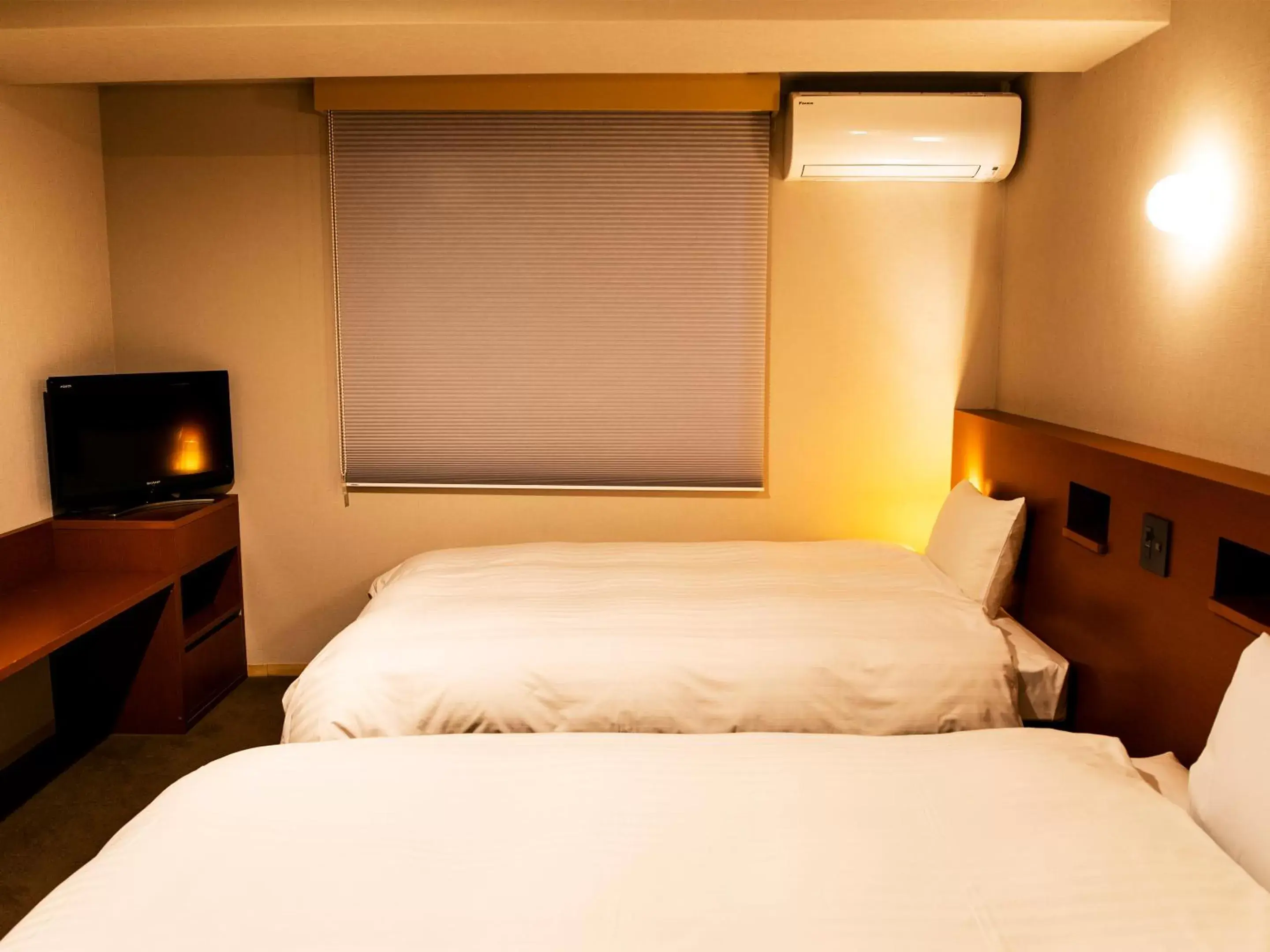 Photo of the whole room, Bed in Hotel New Nishino