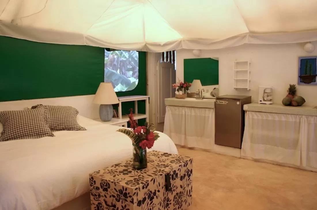 Bed in Junto al Rio Bungalows & Suites