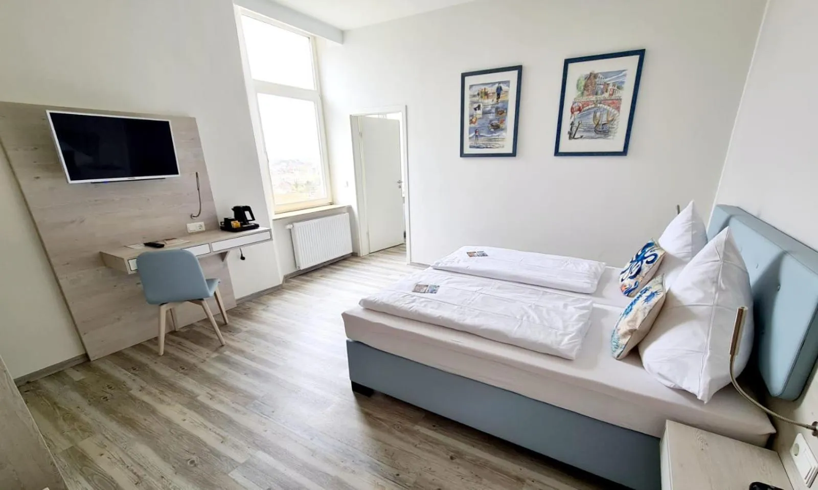 Photo of the whole room, Bed in Nordsee Hotel Borkum