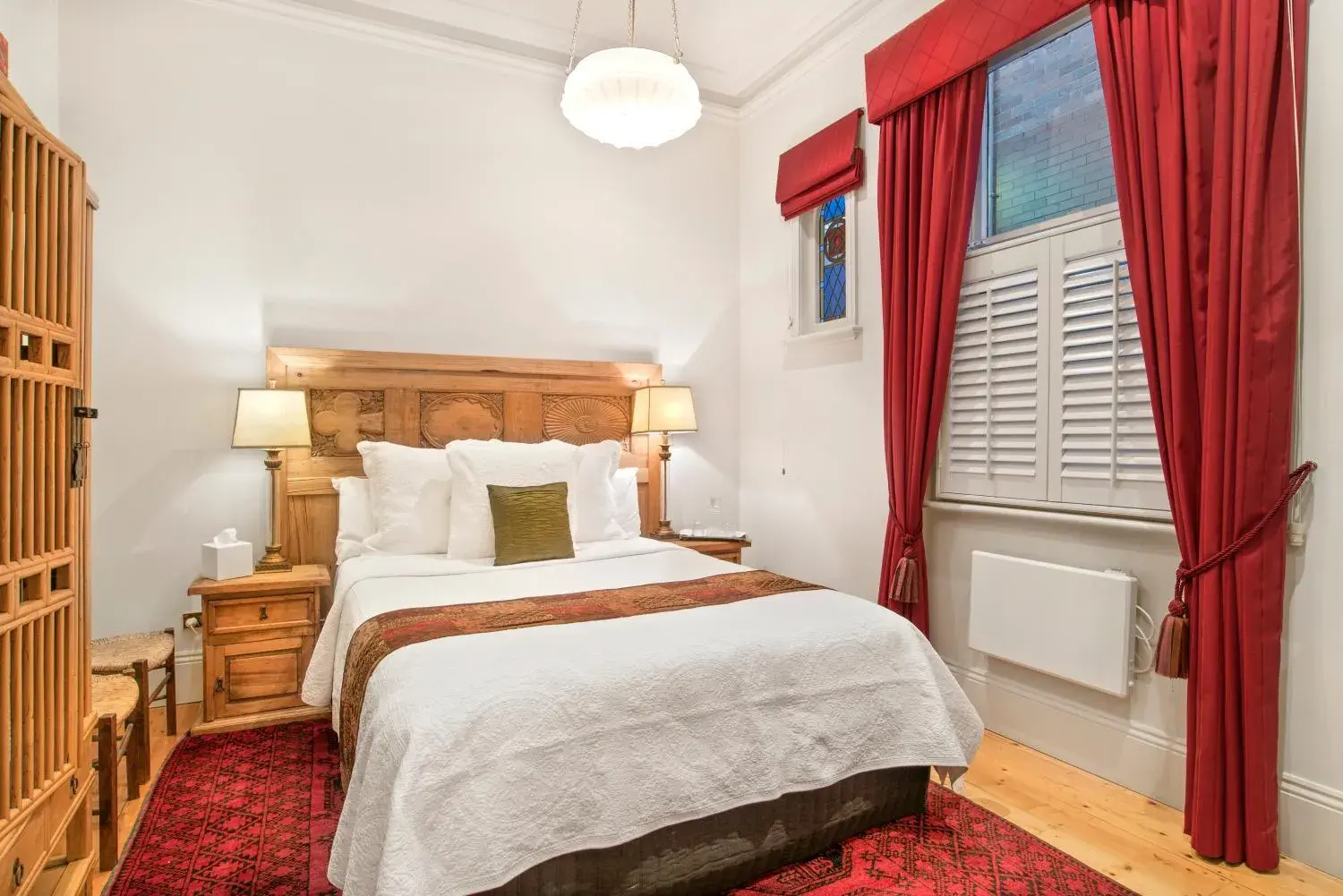 Decorative detail, Bed in Captains Retreat Apartments and Cottages