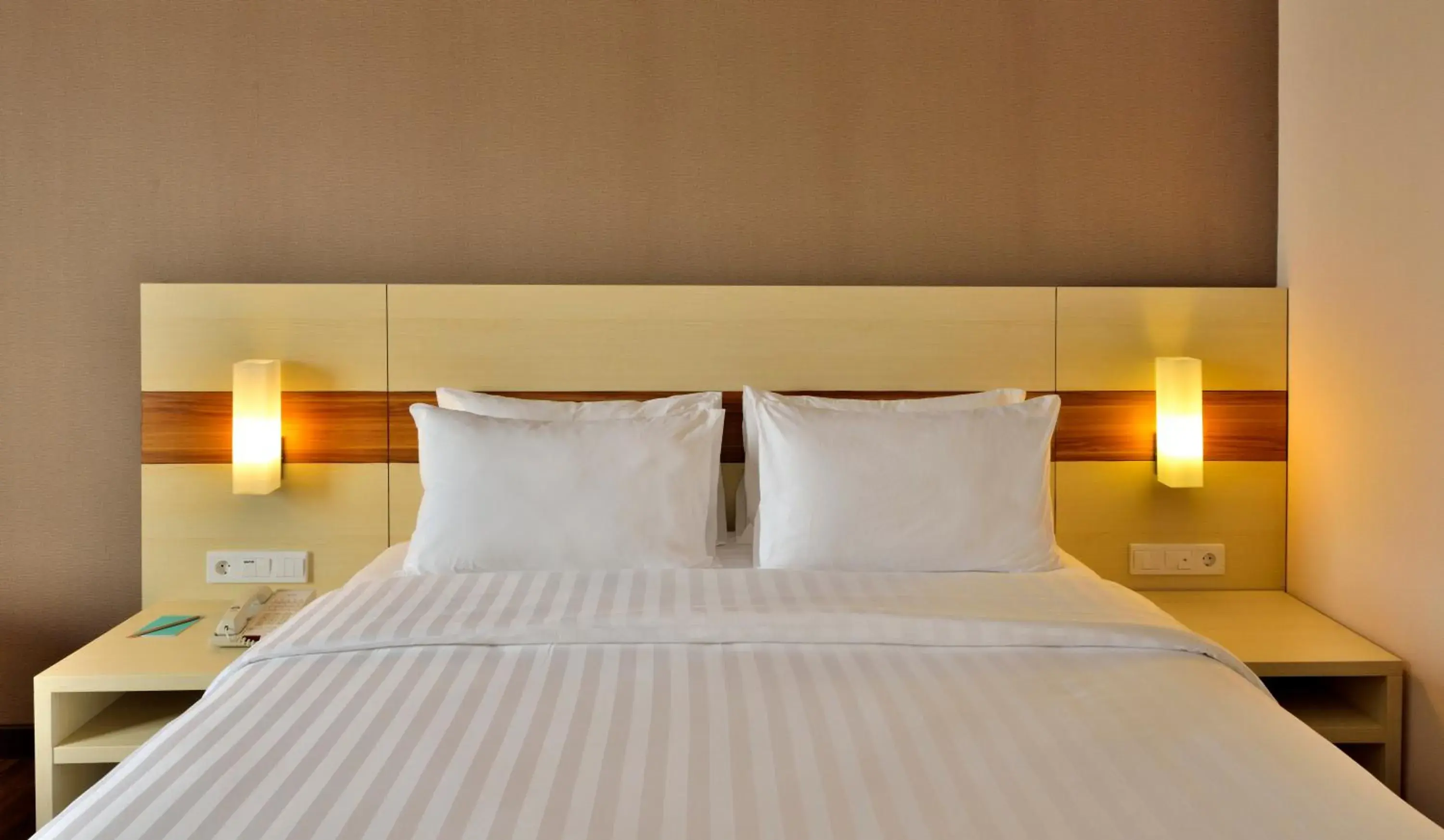 Bed in California Hotel Bandung