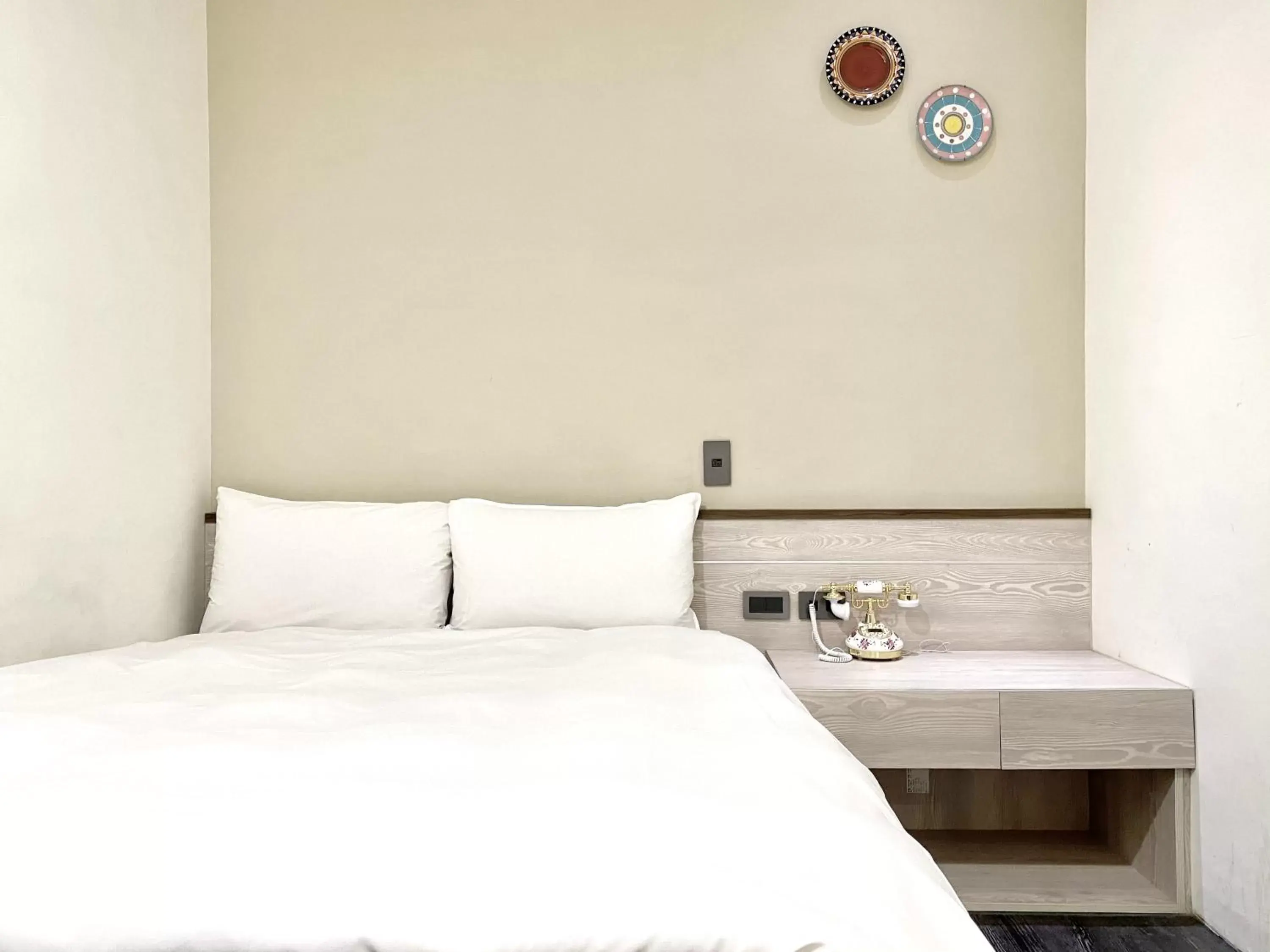 Bed in Raise Hotel Taichung