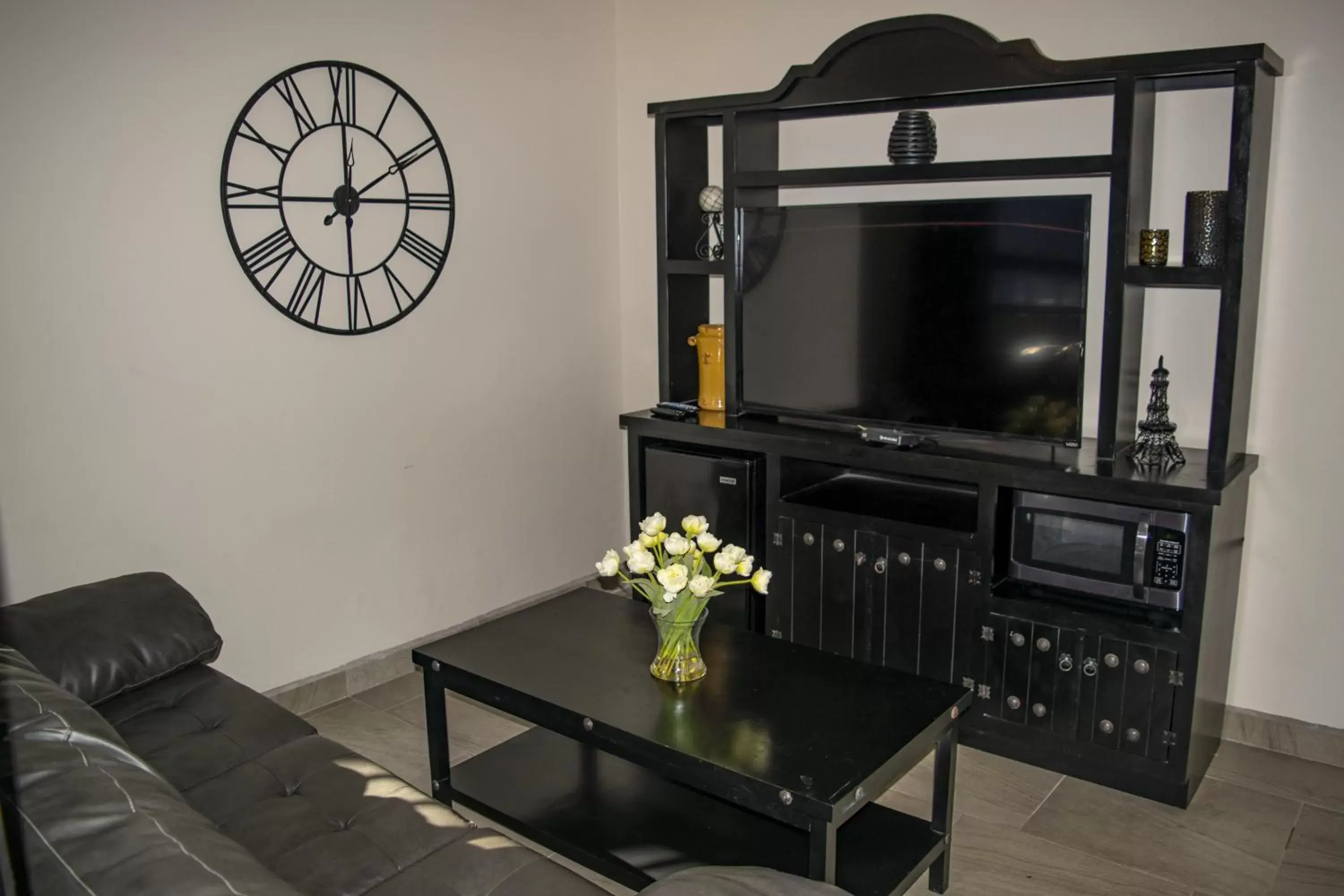 TV/Entertainment Center in Playas Hotel Suites