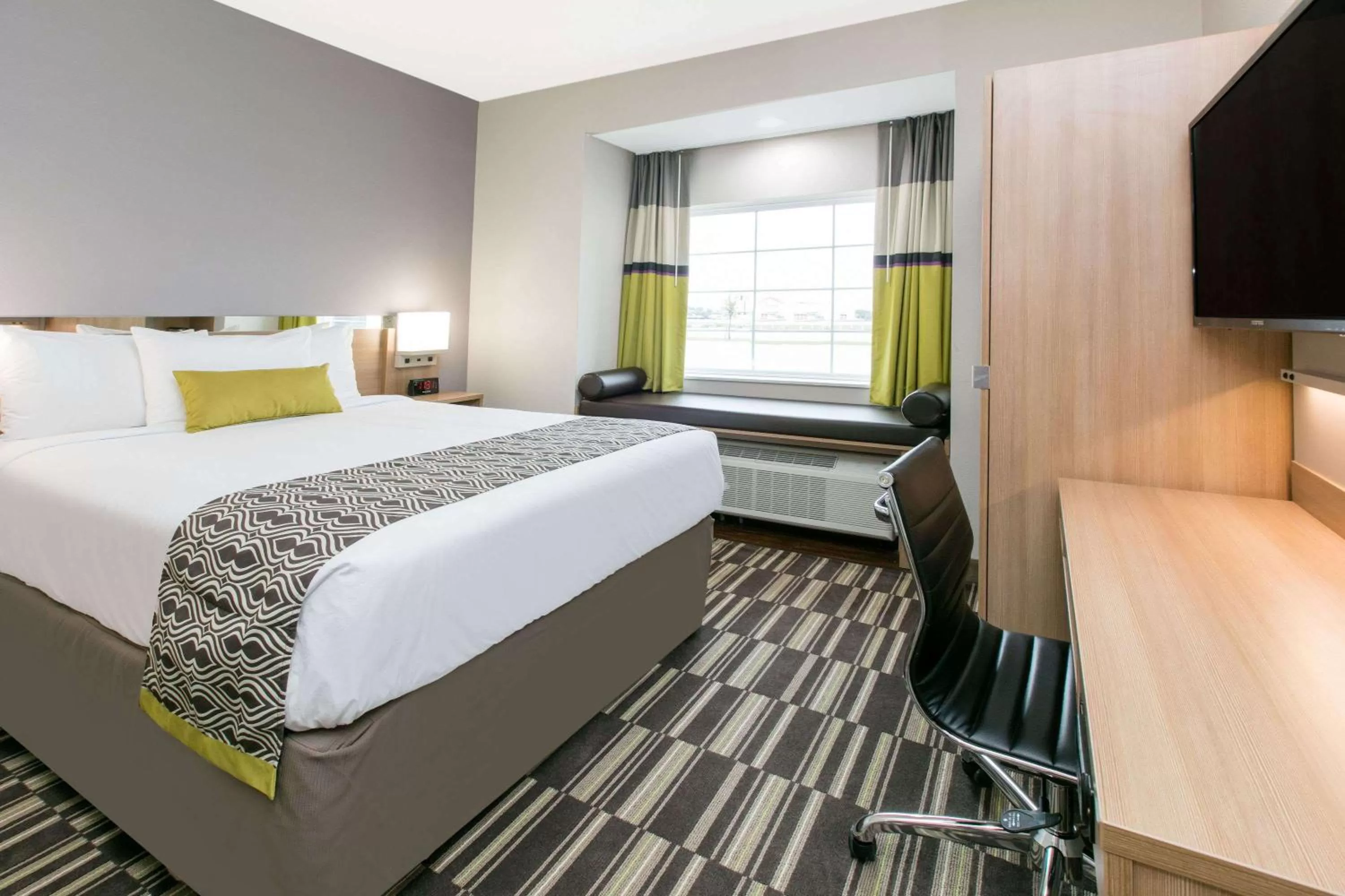 Photo of the whole room, Bed in Microtel Inn & Suites by Wyndham Lubbock