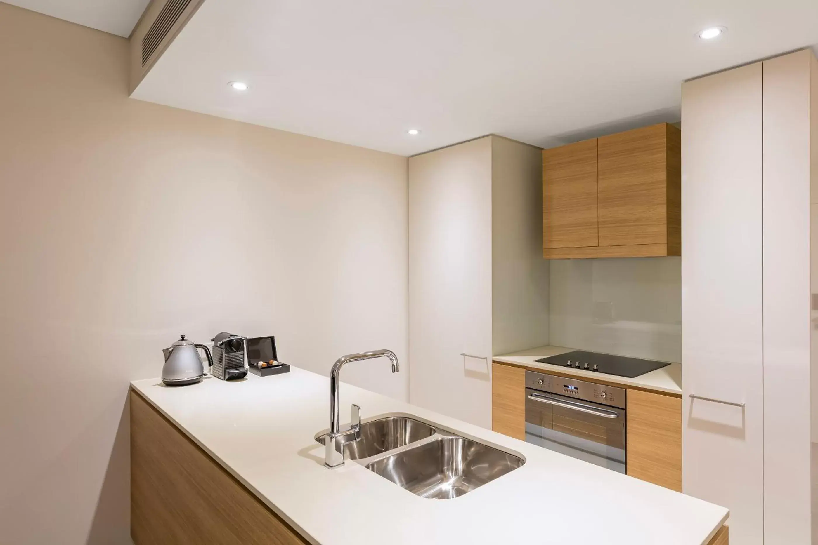 Kitchen/Kitchenette in SKYE Hotel Suites Parramatta