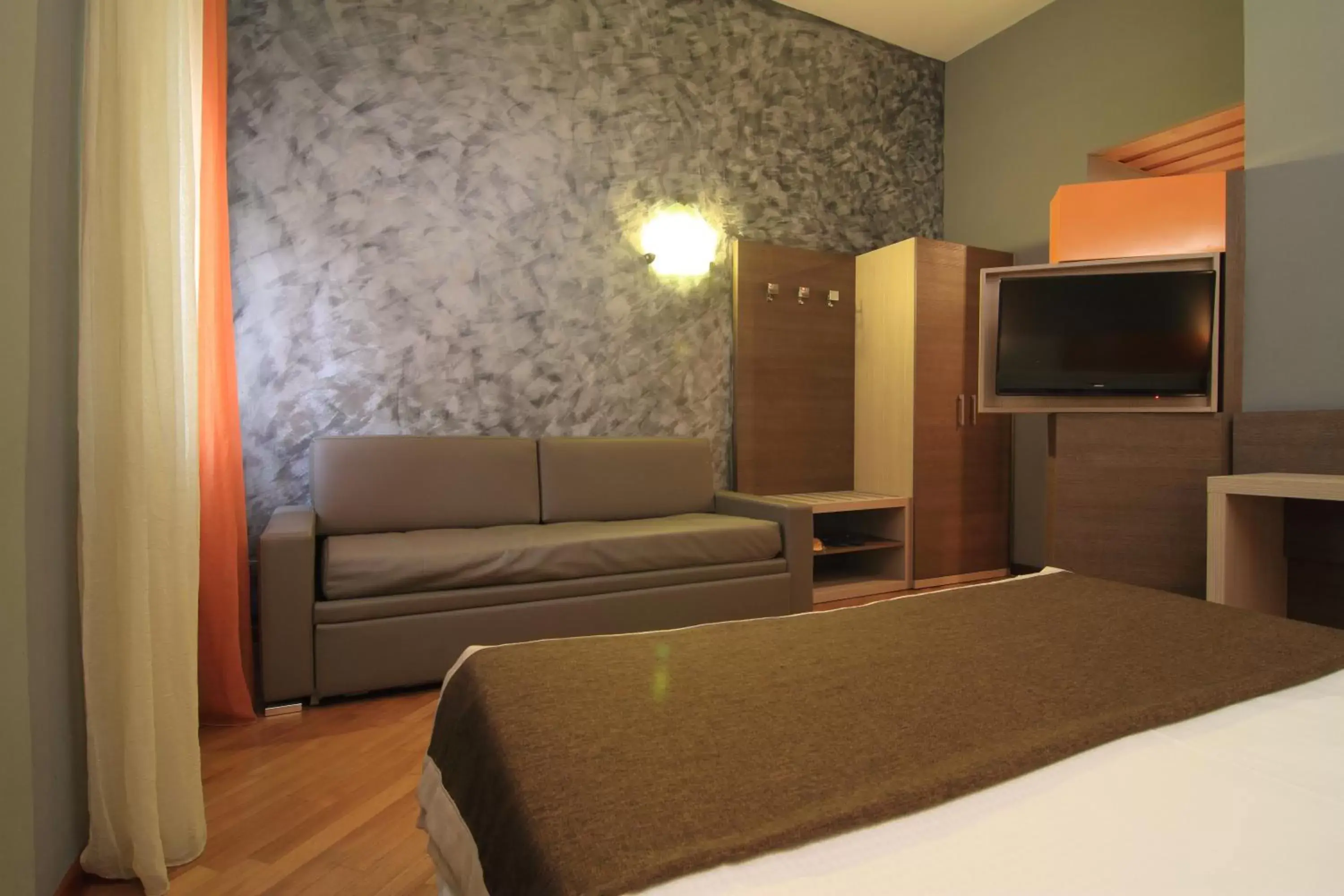 Bedroom, Seating Area in Hotel Metrò