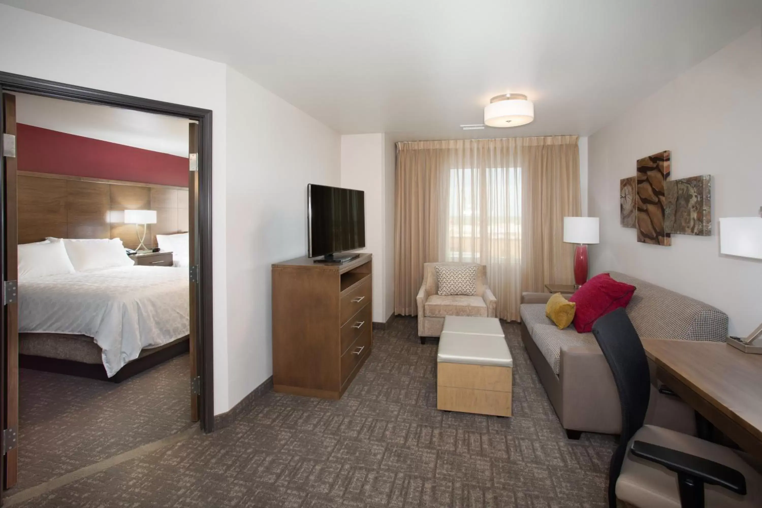Photo of the whole room, Bed in Staybridge Suites Rapid City - Rushmore, an IHG Hotel