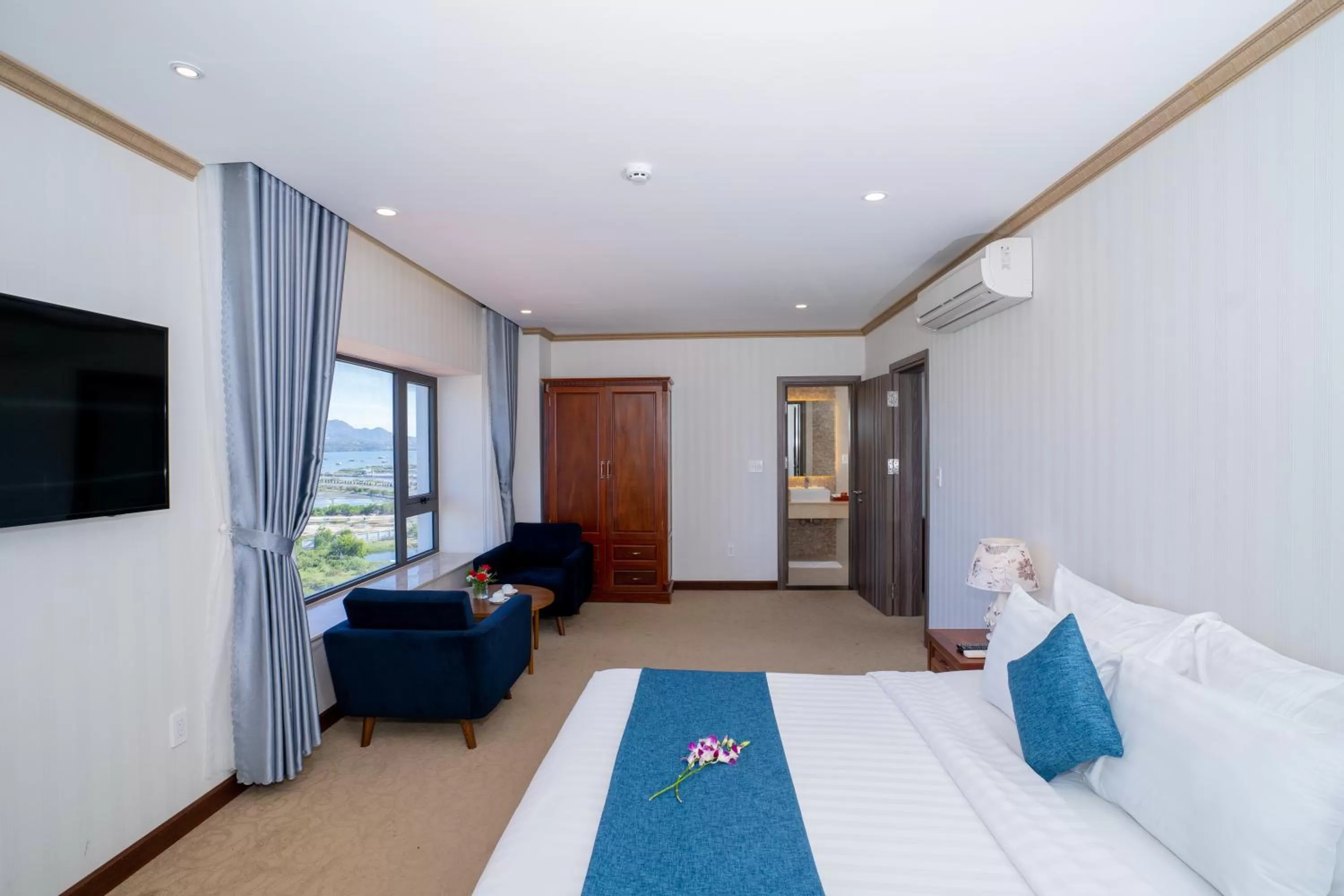 Seating area, Bed in Navy Hotel Cam Ranh