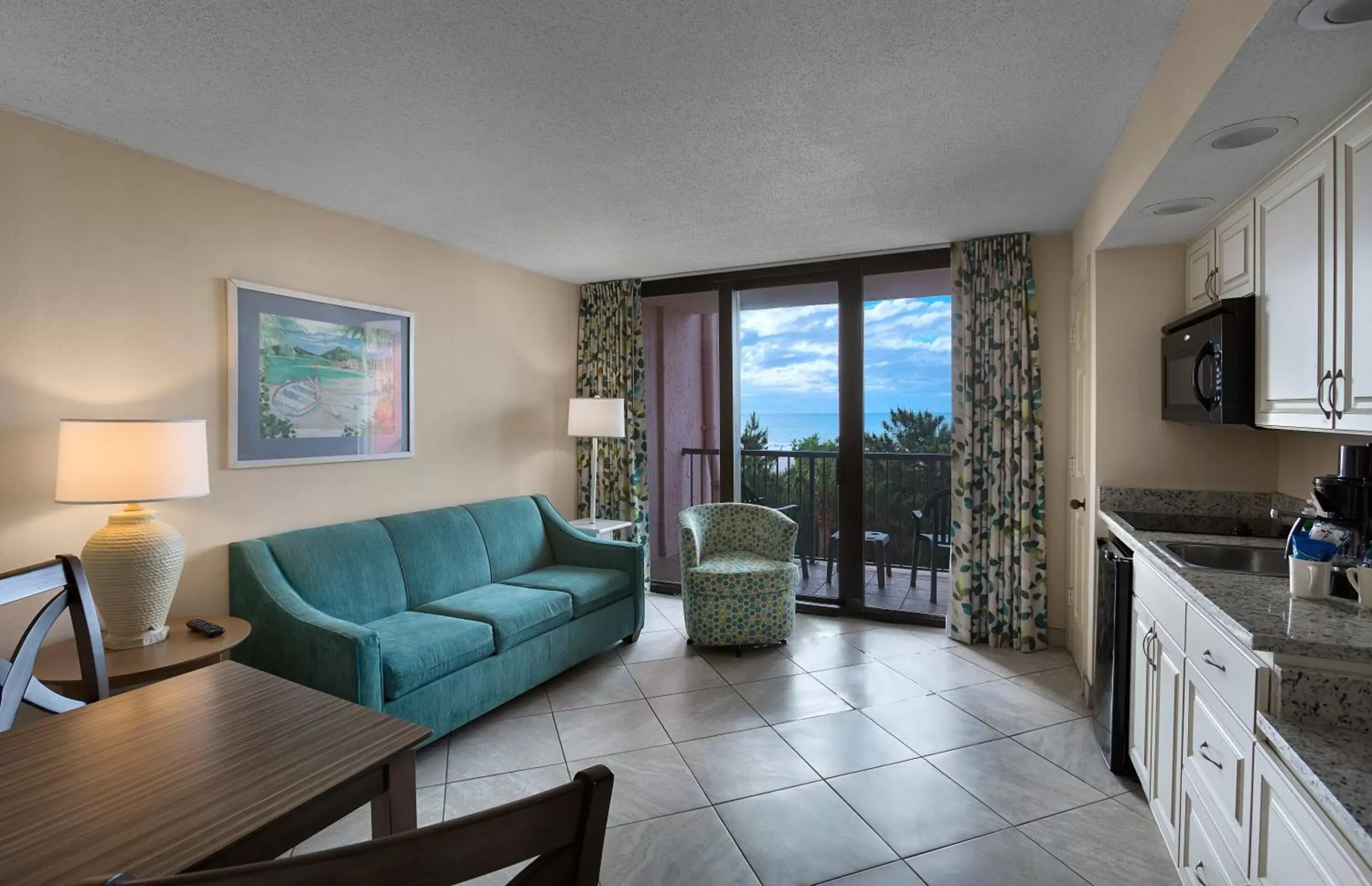 Living room in Beach Colony Resort