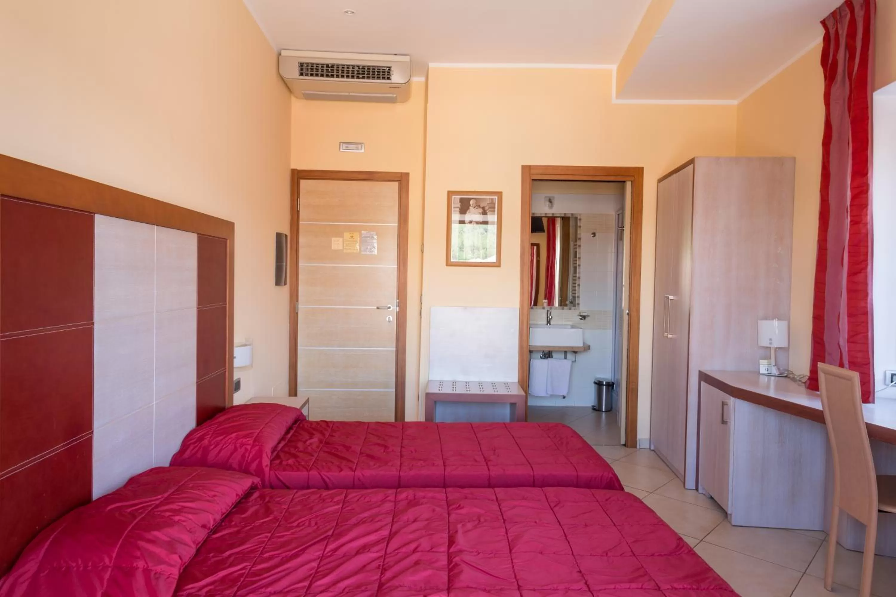 Bed in Hotel Conte Ruggero