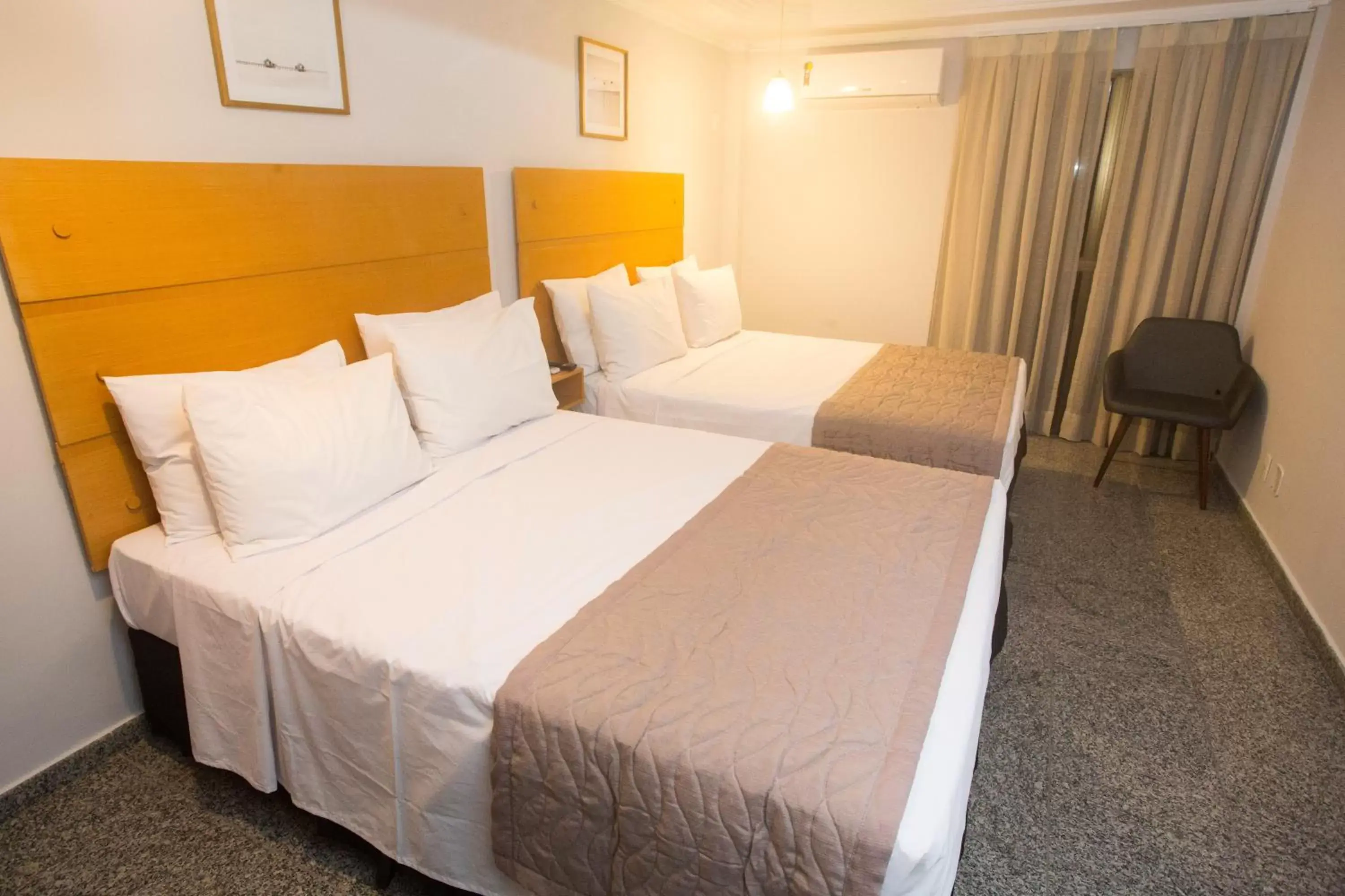 Bed in Regency Copacabana Hotel Bed in Regency Copacabana Hotel