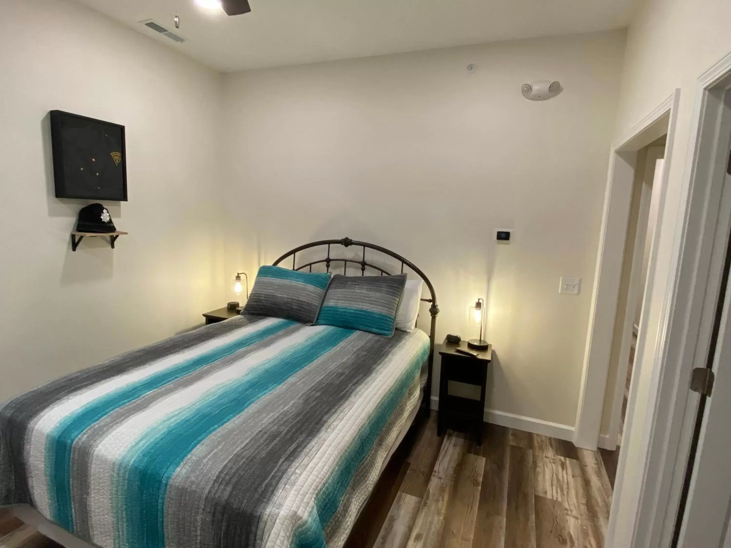 Bed in Hermann Crown Suites