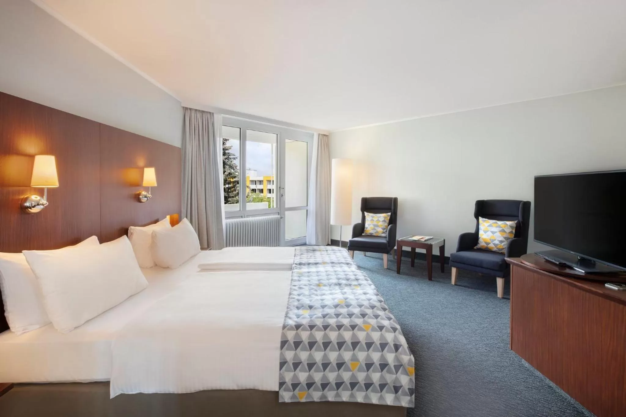 Photo of the whole room, Bed in Holiday Inn Munich - South by IHG